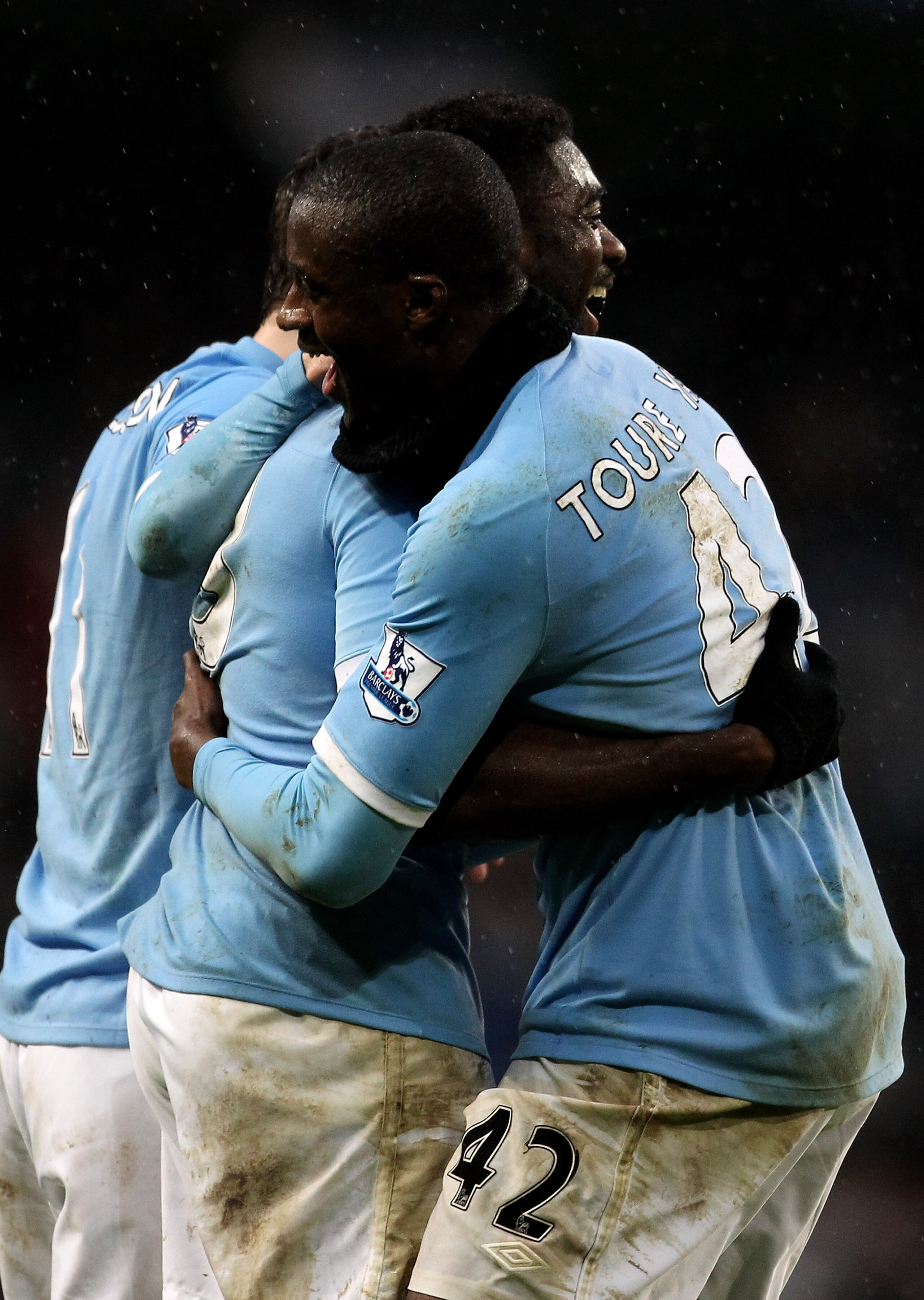 MANCHESTER, ENGLAND - JANUARY 15:  Kolo Toure of Manchester City celebrates scoring his team's first goal with brother and team mate Yaya Toure (R) during the Barclays Premier League match between Manchester City and Wolverhampton Wanderers at the City of