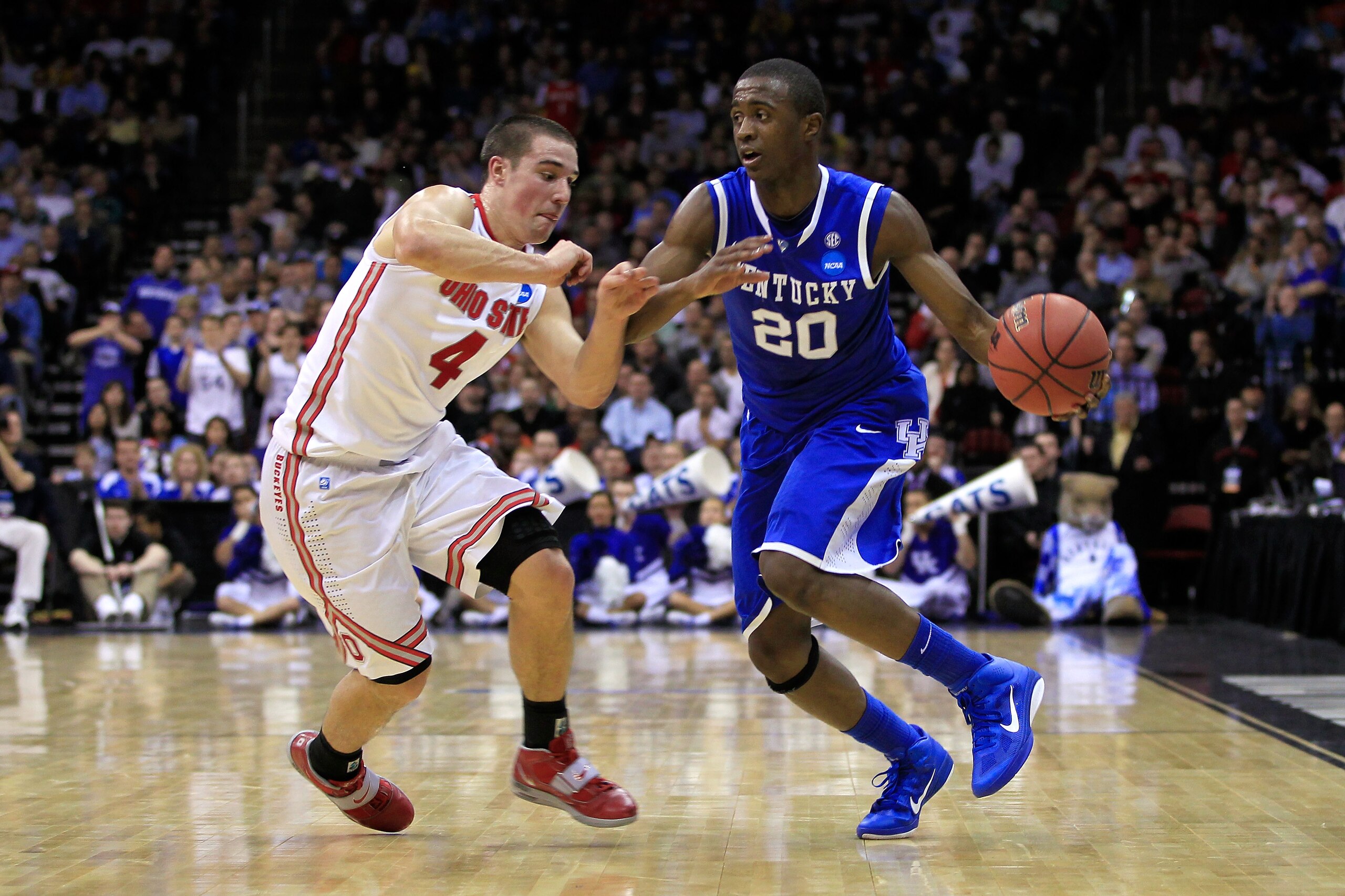 NEWARK, NJ - MARCH 25:  Doron Lamb #20 of the Kentucky Wildcats in action against Aaron Craft #4 of the Ohio State Buckeyes during the east regional semifinal of the 2011 NCAA Men's Basketball Tournament at the Prudential Center on March 25, 2011 in Newar