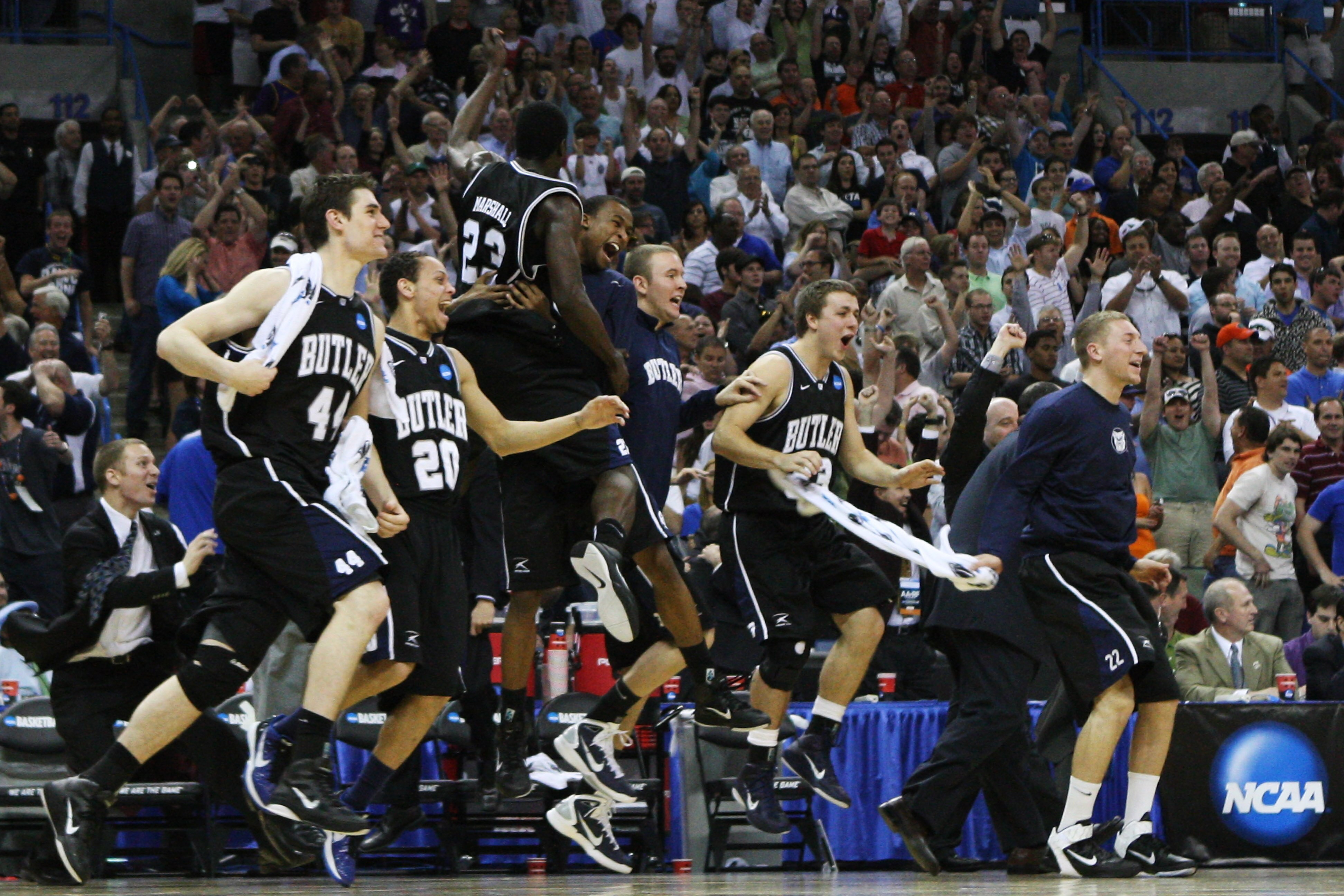 NEW ORLEANS, LA - MARCH 26:  The Butler Bulldogs celebrate after defeating the Florida Gators 74 to 71 in overtime during the Southeast regional final of the 2011 NCAA men's basketball tournament at New Orleans Arena on March 26, 2011 in New Orleans, Loui