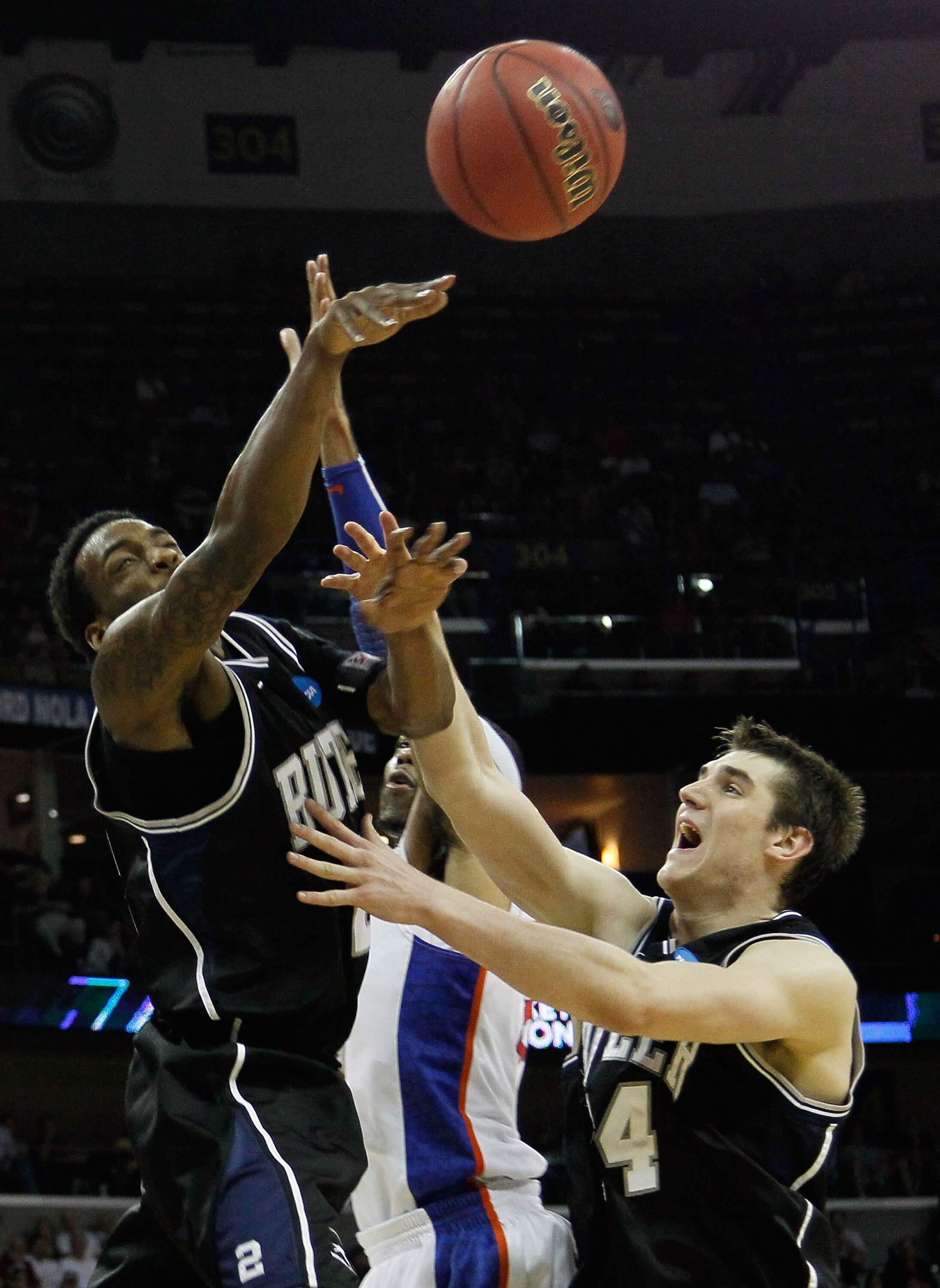 NEW ORLEANS, LA - MARCH 26:  Alex Tyus #23 of the Florida Gators has his shot blocked by Shawn Vanzant #2 and Matt Howard #54 of the Butler Bulldogs during the Southeast regional final of the 2011 NCAA men's basketball tournament at New Orleans Arena on M