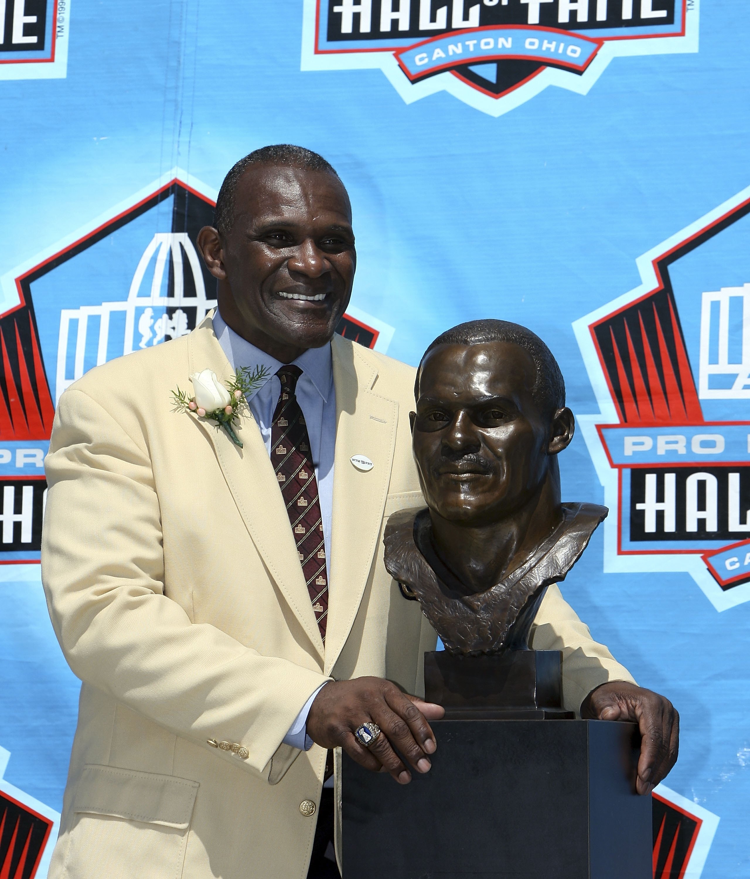 CANTON, OH - AUGUST 05:  Linebacker Harry Carson of the New York Giants poses with his bust after his induction during the Class of 2006 Pro Football Hall of Fame Enshrinement Ceremony at Fawcett Stadium on August 5, 2006 in Canton, Ohio.  (Photo by Doug