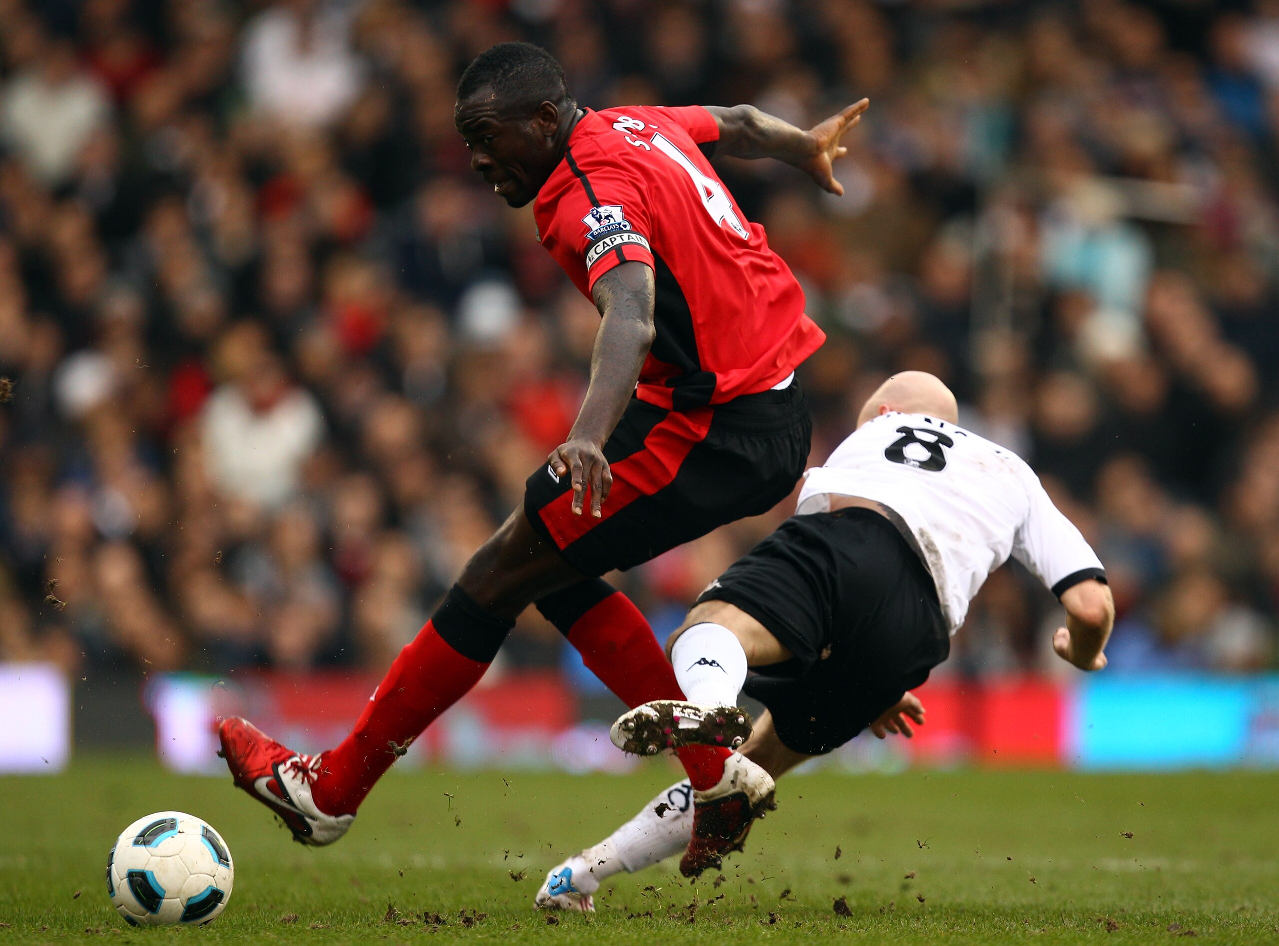 LONDON, ENGLAND - MARCH 05:  Andrew Johnson of Fulham battles with Christopher Samba of Blackburn during the Barclays Premier League match between Fulham and Blackburn Rovers at Craven Cottage on March 5, 2011 in London, England.  (Photo by Richard Heathc