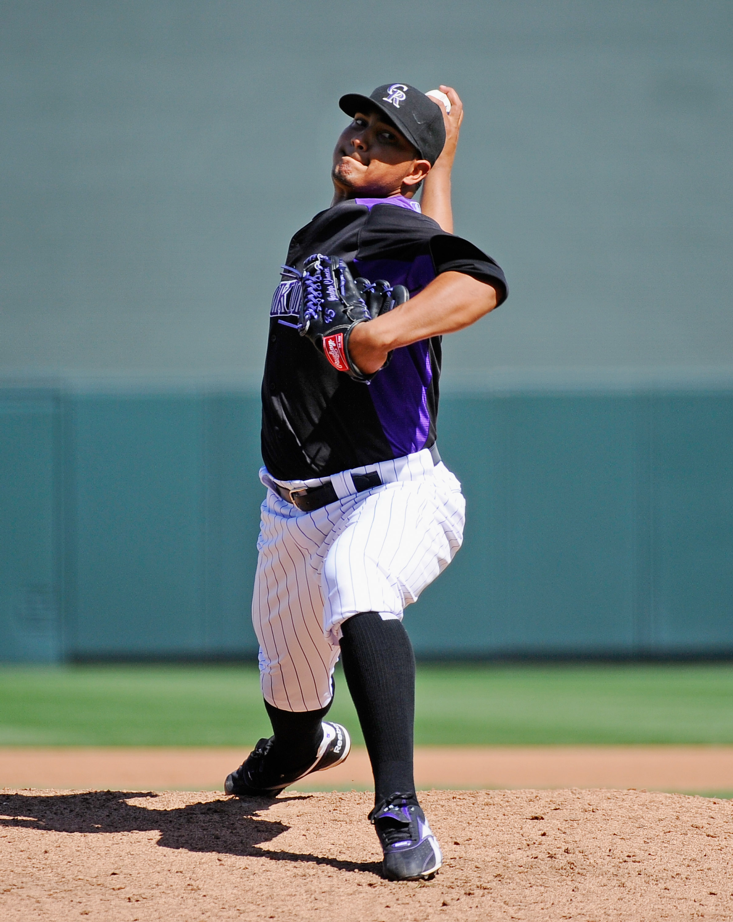 SCOTTSDALE, AZ - MARCH 14:  Pitcher Jhoulys Chacin #45 of the Colorodo Rockies against the Cincinnati Reds  during the spring training baseball game at Salt River Fields at Talking Stick on March 14, 2011 in Scottsdale, Arizona.  (Photo by Kevork Djansezi