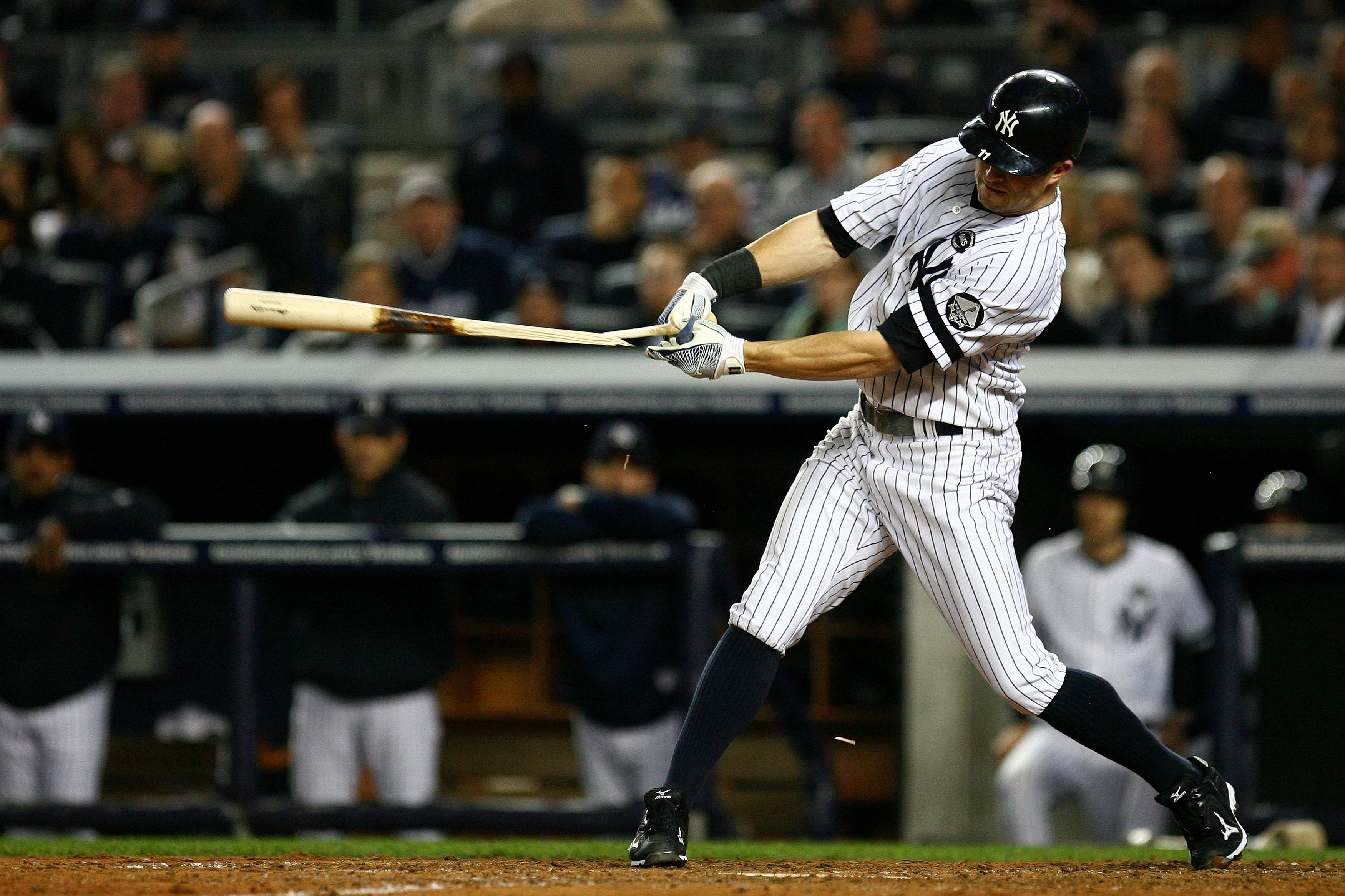 NEW YORK - OCTOBER 19:  Brett Gardner #11 of the New York Yankees breaks his bat while hitting an RBI in the fourth inning against the Texas Rangers in Game Four of the ALCS during the 2010 MLB Playoffs at Yankee Stadium on October 19, 2010 in the Bronx b