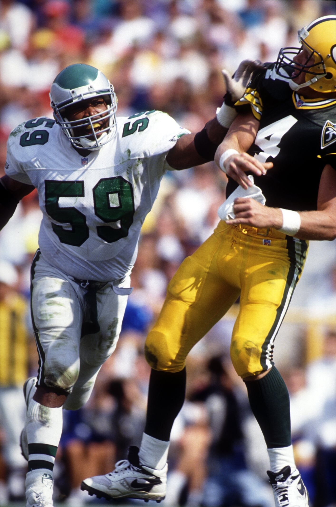 Seth Joyner (Philadelphia Eagles) attempts a sack of Packers quarterback, Brett Favre. Mandatory Credit: Jonathan Daniel/ALLSPORT