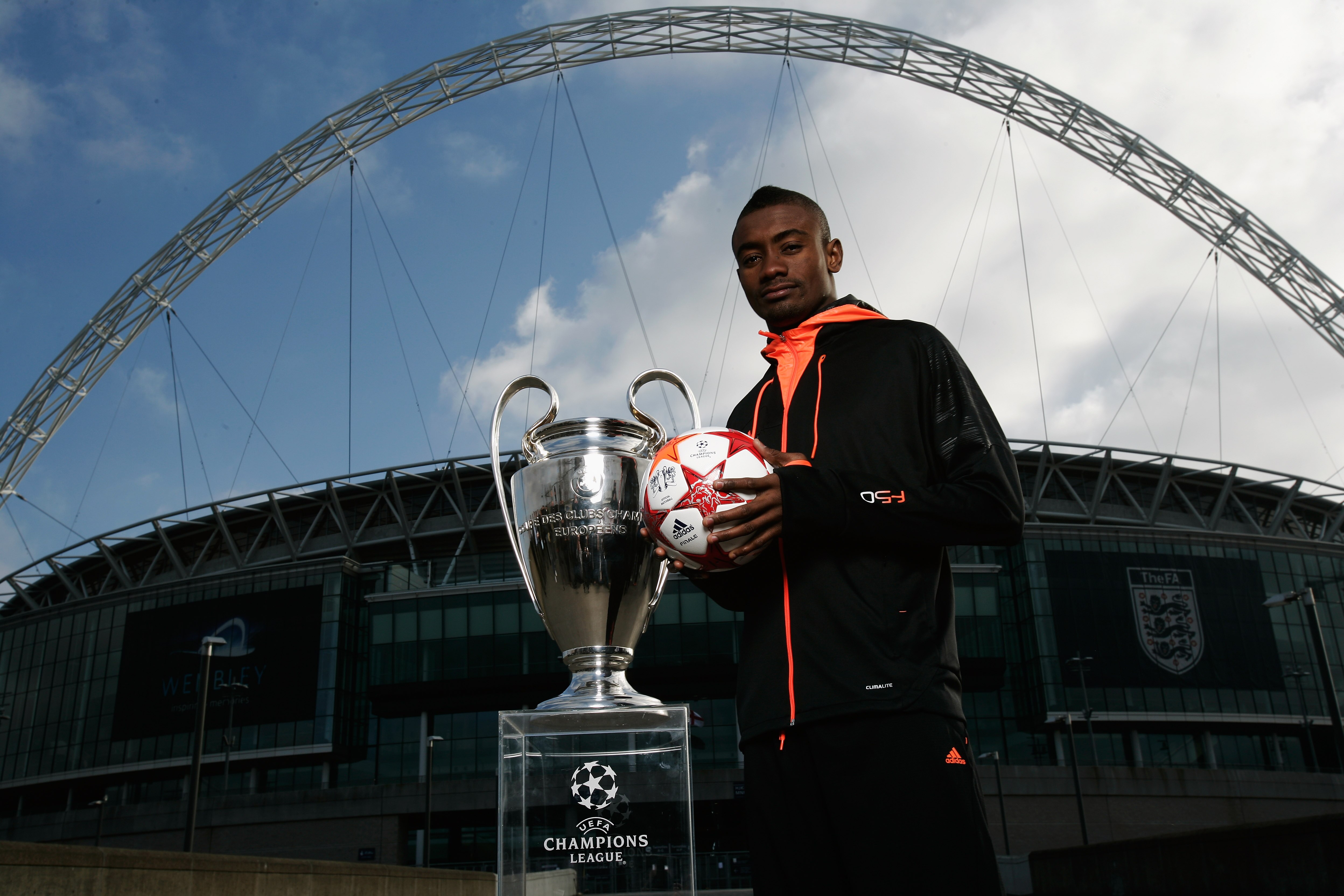 LONDON, ENGLAND - MARCH 03:  Salomon Kalou of Chelsea is seen under the Wembley arch with the Champions League Trophy as adidas present the Official Match Ball for the 2011 UEFA Champions League Final at Wembley Stadium on March 3, 2011 in London, United