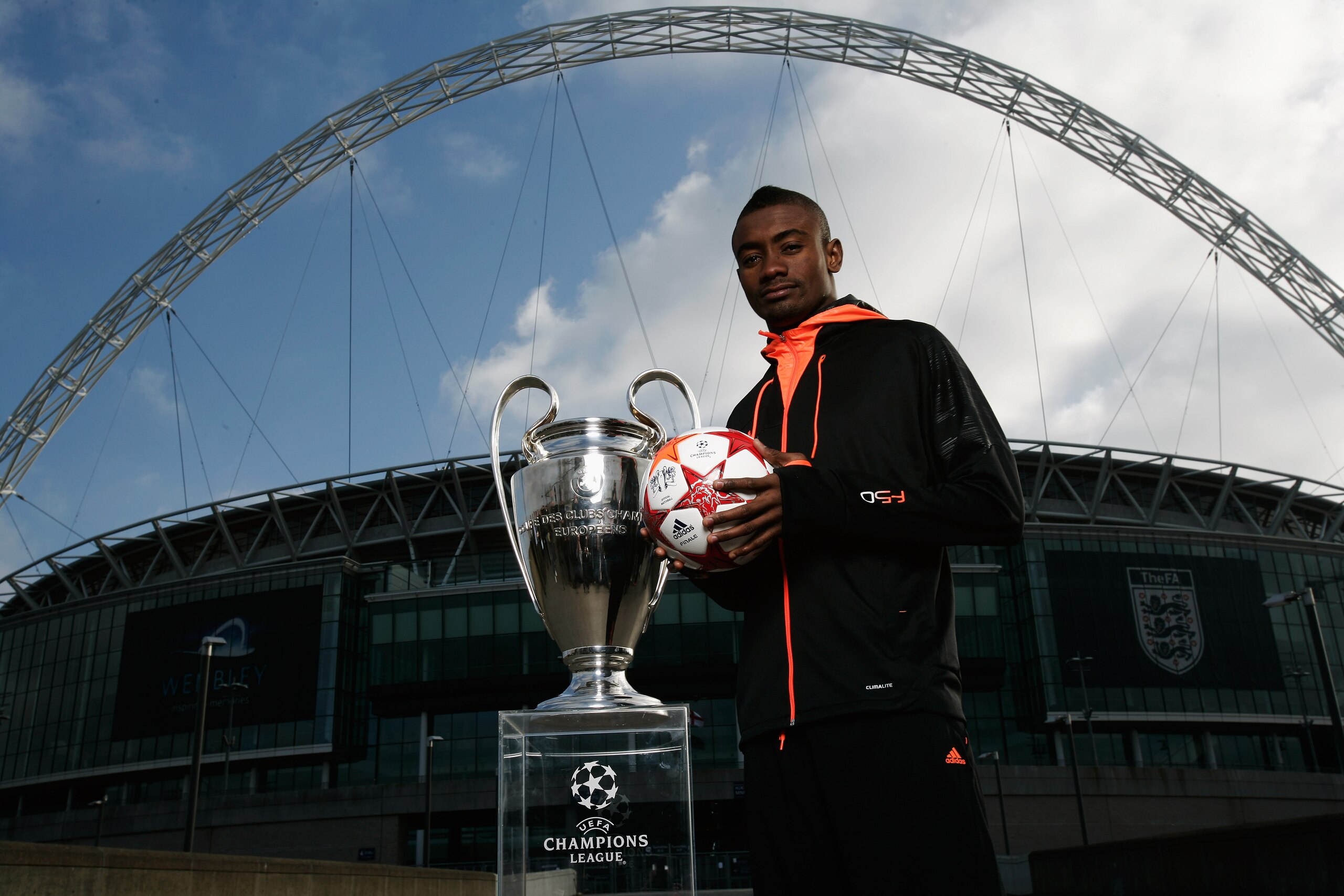LONDON, ENGLAND - MARCH 03:  Salomon Kalou of Chelsea is seen under the Wembley arch with the Champions League Trophy as adidas present the Official Match Ball for the 2011 UEFA Champions League Final at Wembley Stadium on March 3, 2011 in London, United
