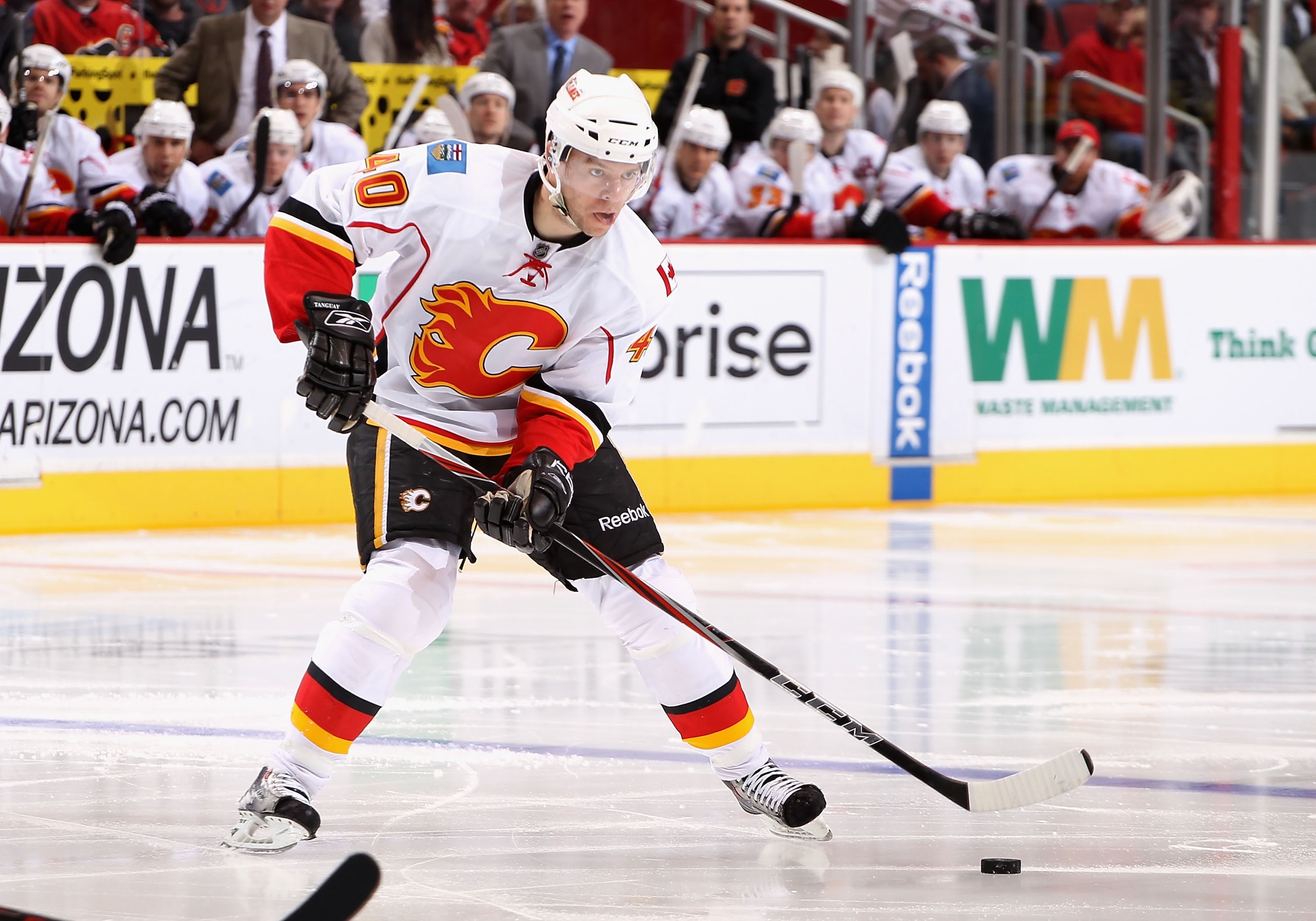 GLENDALE, AZ - MARCH 10: Alex Tanguay #40 of the Calgary Flames skates with the puck during the NHL game against the Phoenix Coyotes at Jobing.com Arena on March 10, 2011 in Glendale, Arizona. The Coyotes defeated the Flames 3-0. (Photo by Christian Pe GLENDALE, AZ - MARCH 10: Alex Tanguay #40 of the Calgary Flames skates with the puck during the NHL game against the Phoenix Coyotes at Jobing.com Arena on March 10, 2011 in Glendale, Arizona. The Coyotes defeated the Flames 3-0. (Photo by Christian Pe