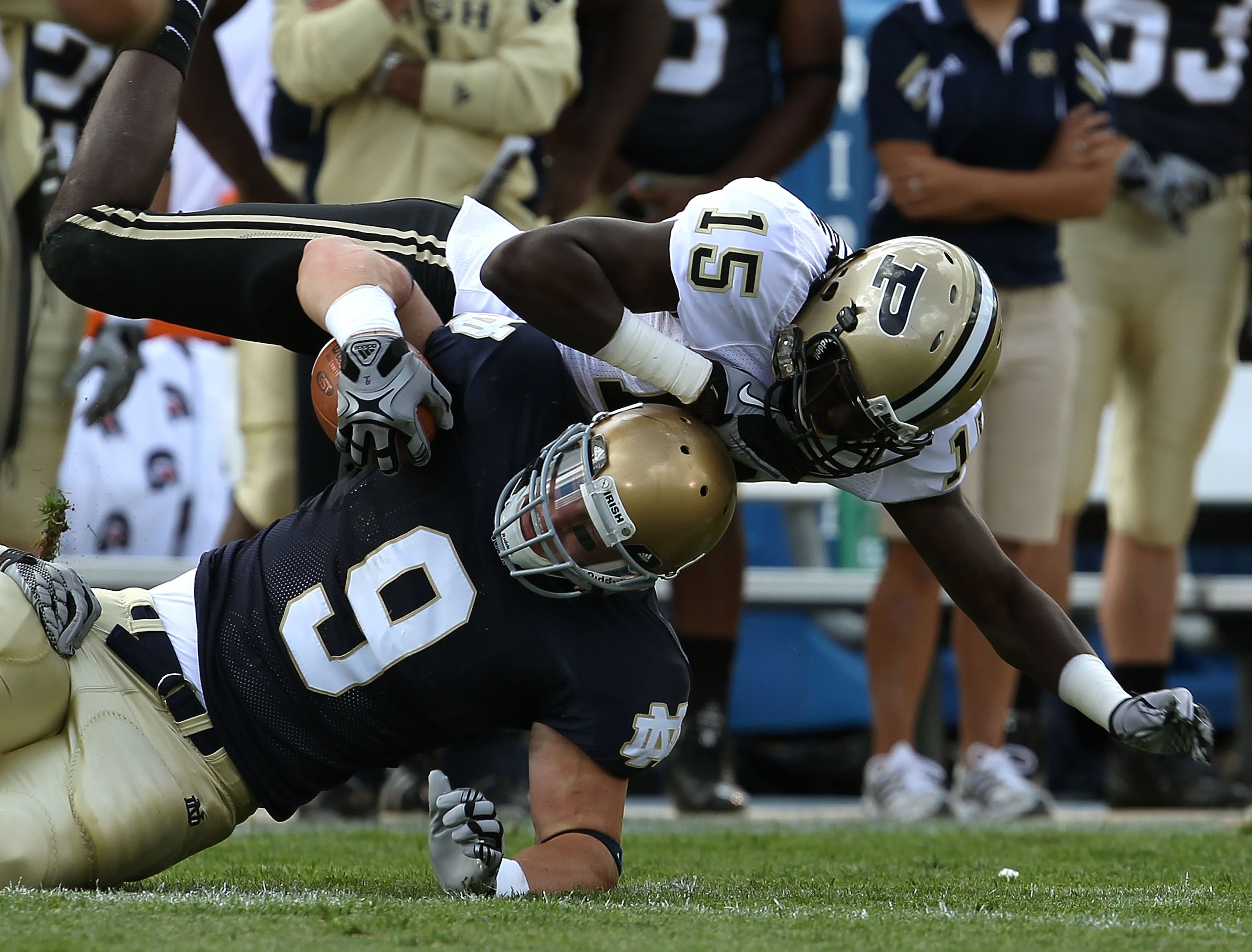 SOUTH BEND, IN - SEPTEMBER 04: Kyle Rudolph #9 of the Notre Dame Fighting Irish is tackled by Charlton Williams #15 of the Purdue Boilermakers at Notre Dame Stadium on September 4, 2010 in South Bend, Indiana. Notre Dame defeated Purdue 23-12. (Photo by SOUTH BEND, IN - SEPTEMBER 04: Kyle Rudolph #9 of the Notre Dame Fighting Irish is tackled by Charlton Williams #15 of the Purdue Boilermakers at Notre Dame Stadium on September 4, 2010 in South Bend, Indiana. Notre Dame defeated Purdue 23-12. (Photo by