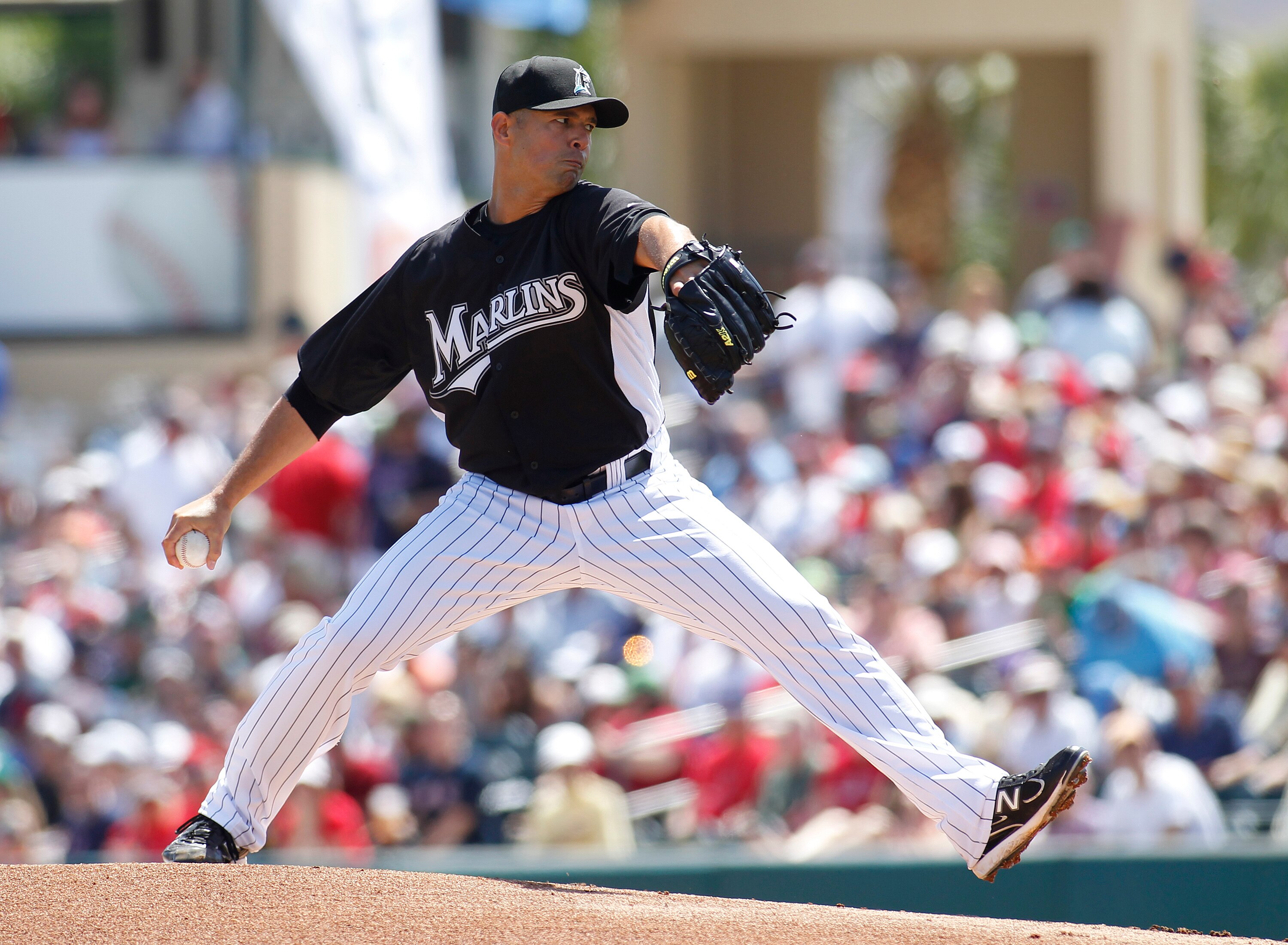 JUPITER, FL - MARCH 24: Javier Vazquez #23 of the Florida Marlins throws the ball against the Boston Red Sox in the first inning at Roger Dean Stadium on March 24, 2011 in Jupiter, Florida. (Photo by Joel Auerbach/Getty Images)