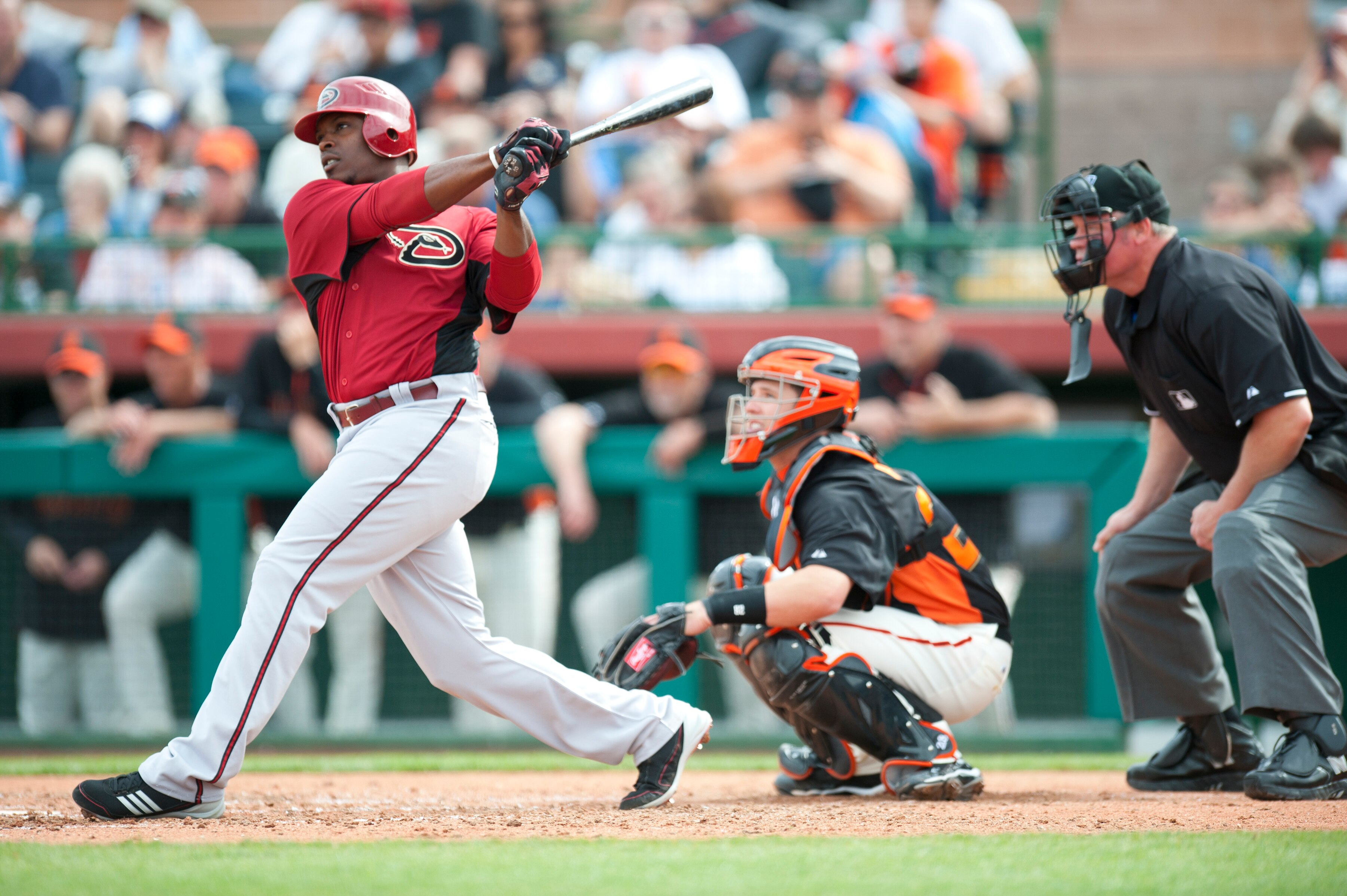 SCOTTSDALE, AZ - FEBRUARY 25: Justin Upton #10 of the Arizona Diamondbacks bats during a spring training game San Francisco Giant at Scottsdale Stadium on February 25, 2011 in Scottsdale, Arizona. (Photo by Rob Tringali/Getty Images)