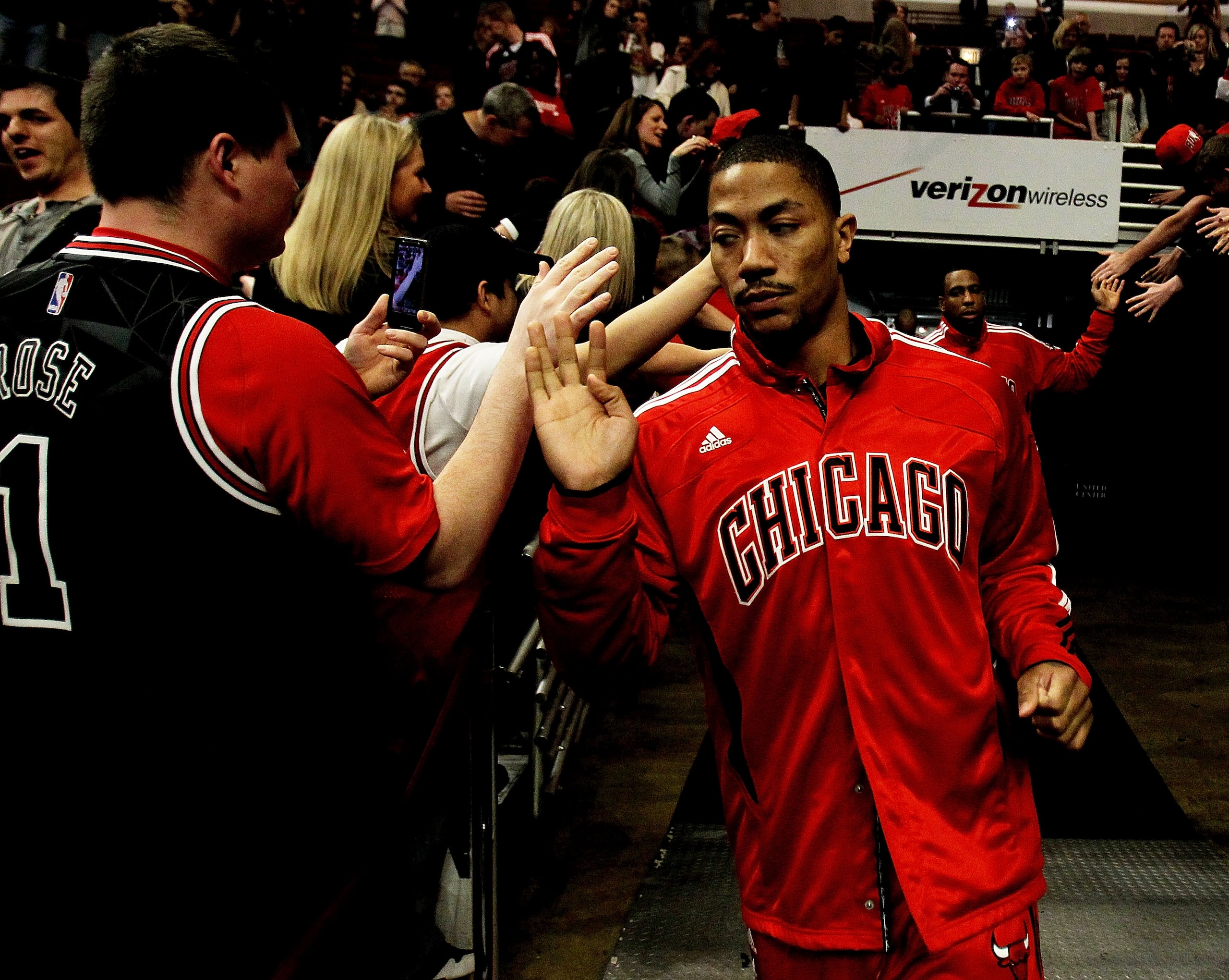 CHICAGO, IL - MARCH 25: Derrick Rose #1 of the Chicago Bulls runs to the court before a game against the Memphis Girzzlies at the United Center on March 25, 2011 in Chicago, Illinois. Rose will donate $1,000.00 for every point he scored tonight to the Dir