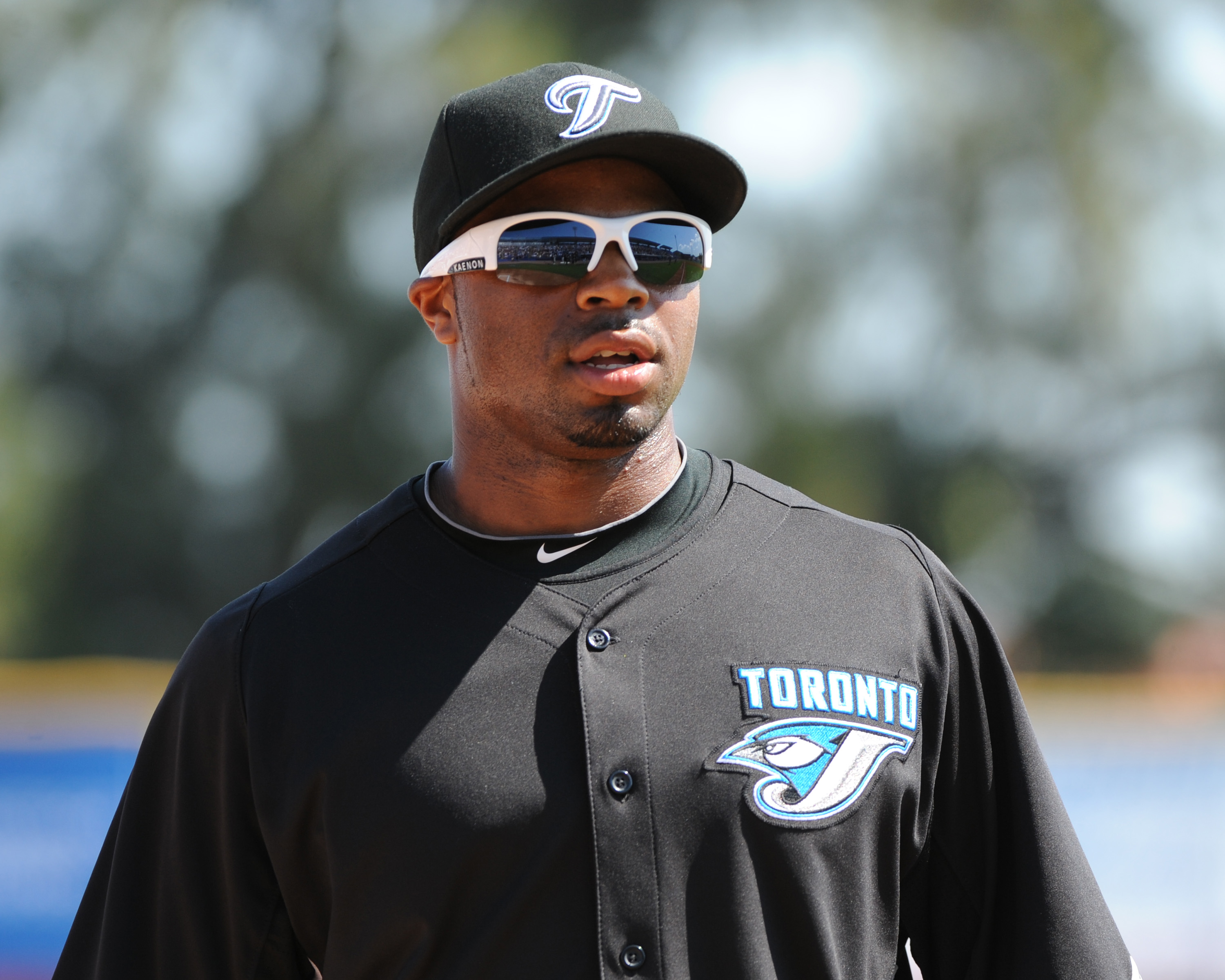 DUNEDIN, FL - FEBRUARY 26:  Outfielder Rajai Davis #11 of the Toronto Blue Jays warms up for play against the Detroit Tigers February 26, 2011 at Florida Auto Exchange Stadium in Dunedin, Florida.  (Photo by Al Messerschmidt/Getty Images)