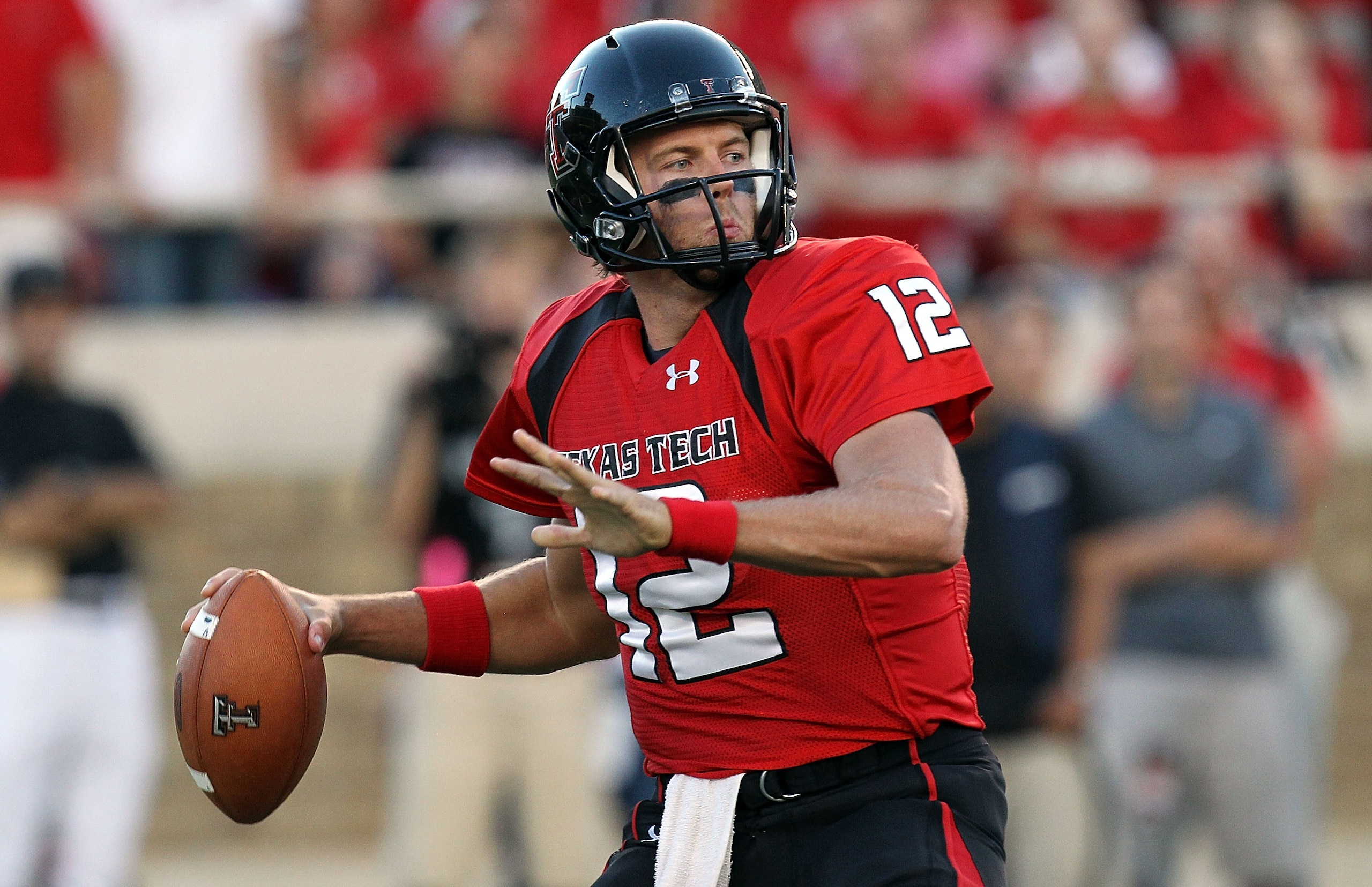 LUBBOCK, TX - SEPTEMBER 18: Quarterback Taylor Potts #12 of the Texas Tech Red Raiders against the Texas Longhorns at Jones AT&T Stadium on September 18, 2010 in Lubbock, Texas. (Photo by Ronald Martinez/Getty Images) LUBBOCK, TX - SEPTEMBER 18: Quarterback Taylor Potts #12 of the Texas Tech Red Raiders against the Texas Longhorns at Jones AT&T Stadium on September 18, 2010 in Lubbock, Texas. (Photo by Ronald Martinez/Getty Images)