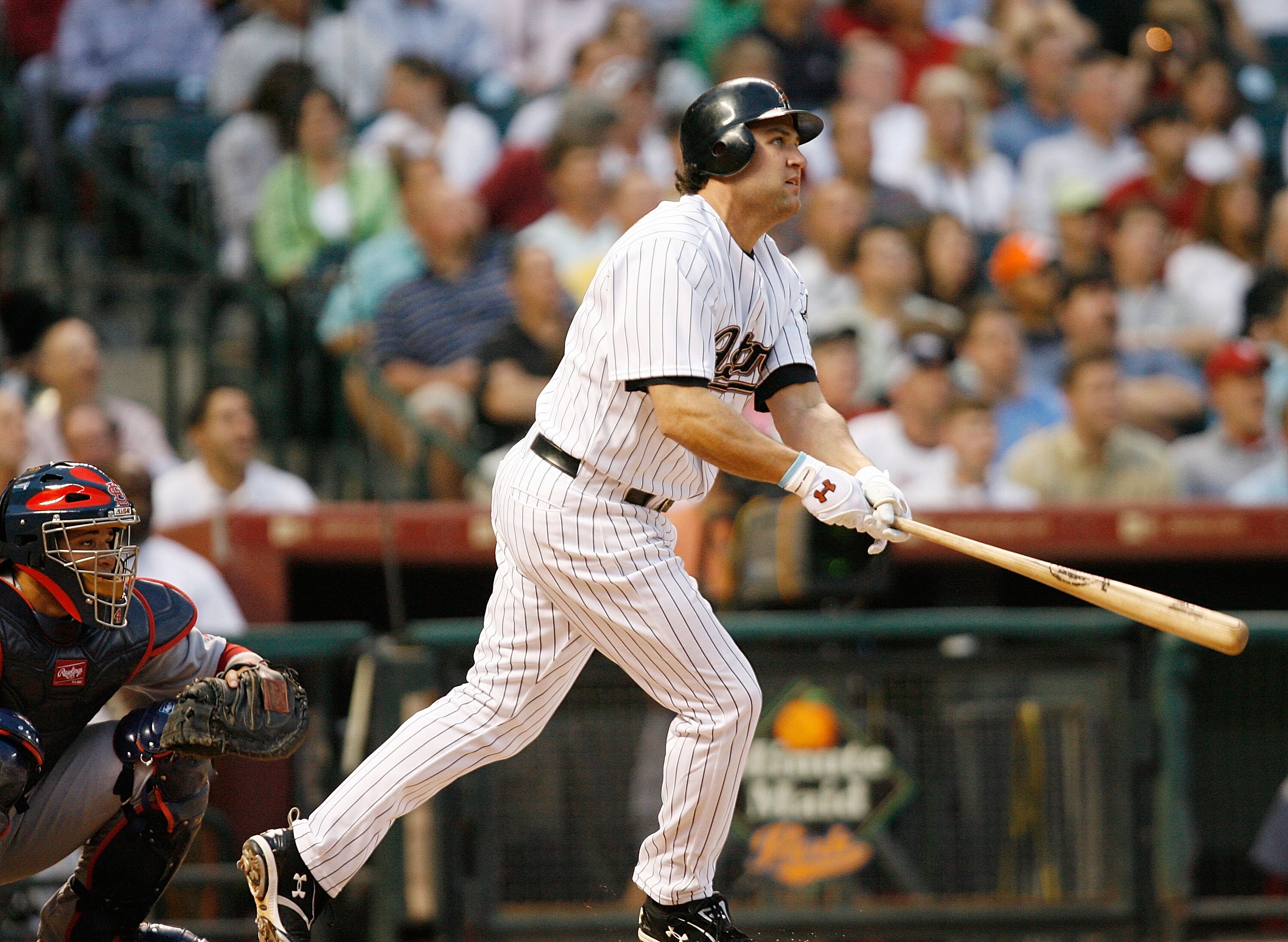 HOUSTON - APRIL 07:  First baseman Lance Berkman #17 of the Houston Astros watches the ball leave the park as he hit a solo home run in the seventh inning against the St. Louis Cardinals on April 7, 2008 at Minute Maid Park in Houston, Texas.  (Photo by B