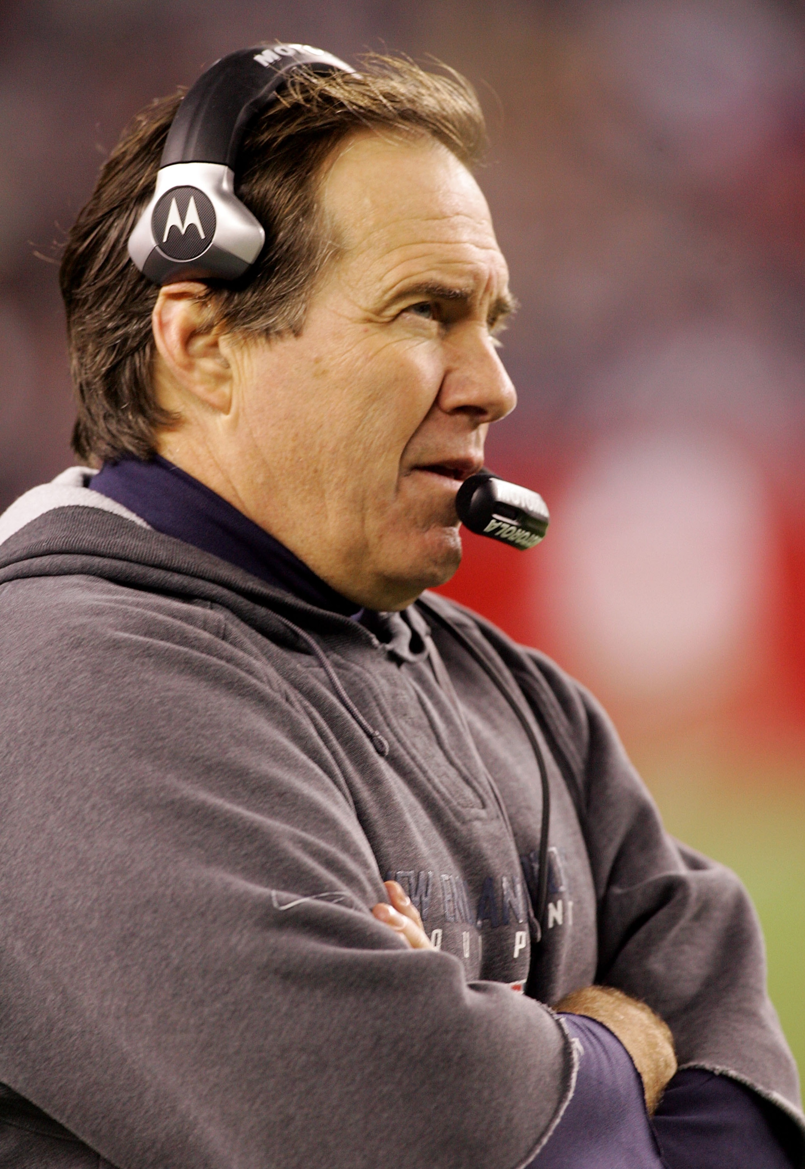 FOXBORO, MA - DECEMBER 23:  Head coach Bill Belichek of the New England Patriots looks on as his team plays the Miami Dolphins at Gillette Stadium on December 23, 2007 in Foxboro, Massachusetts. (Photo by Jim McIsaac/Getty Images)