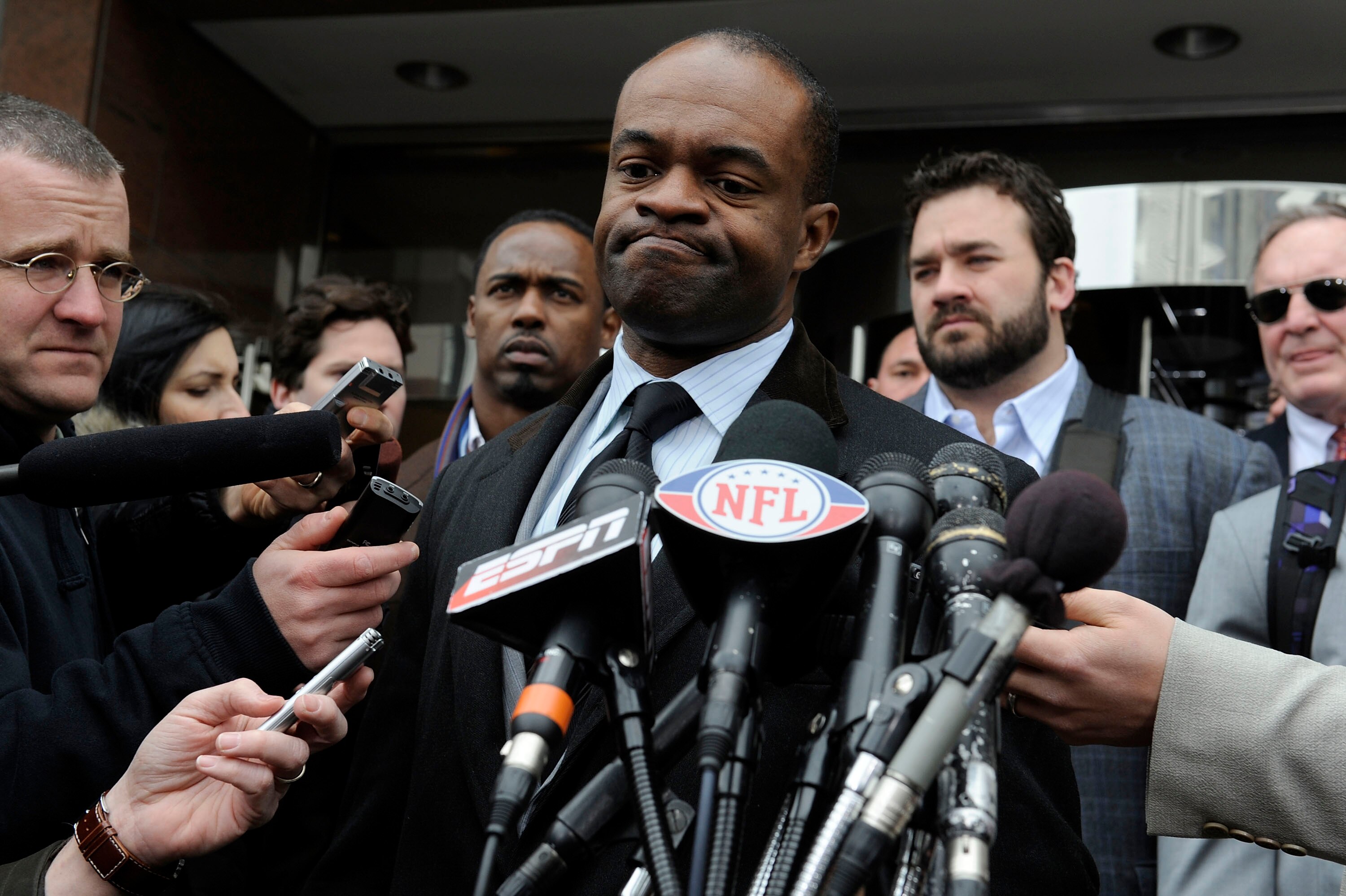 WASHINGTON, DC - MARCH 11:  NFL Players Association Executive Director DeMaurice Smith (C) speaks as he and a group of player representatives arrive for labor talks at the Federal Mediation and Conciliation Service building March 11, 2011 in Washington, D