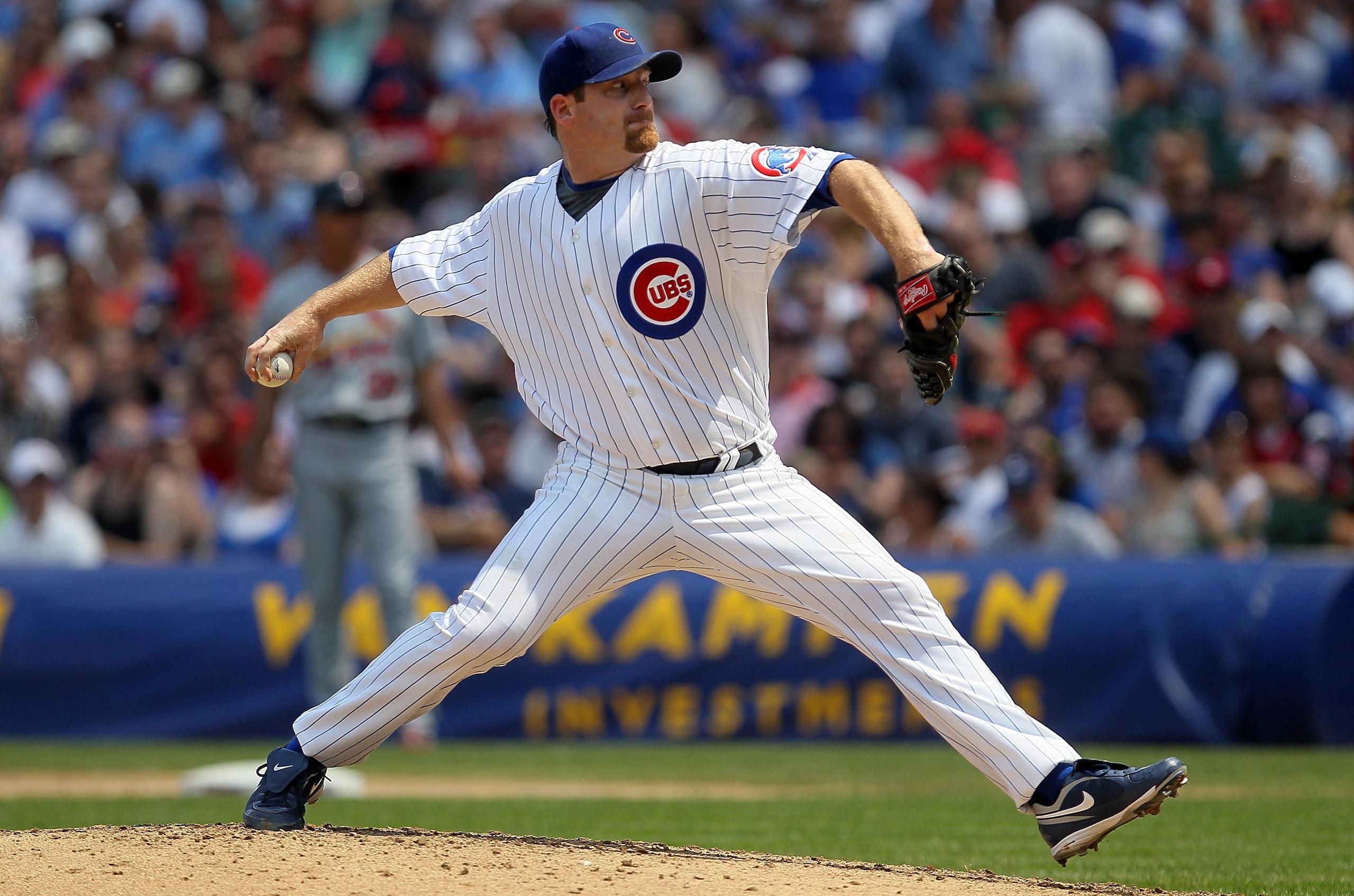 CHICAGO - MAY 30:  Ryan Dempster #46 of the Chicago Cubs delivers a pitch against the St. Louis Cardinals on May 30, 2010 at Wrigley Field in Chicago, Illinois.  (Photo by Jim McIsaac/Getty Images)