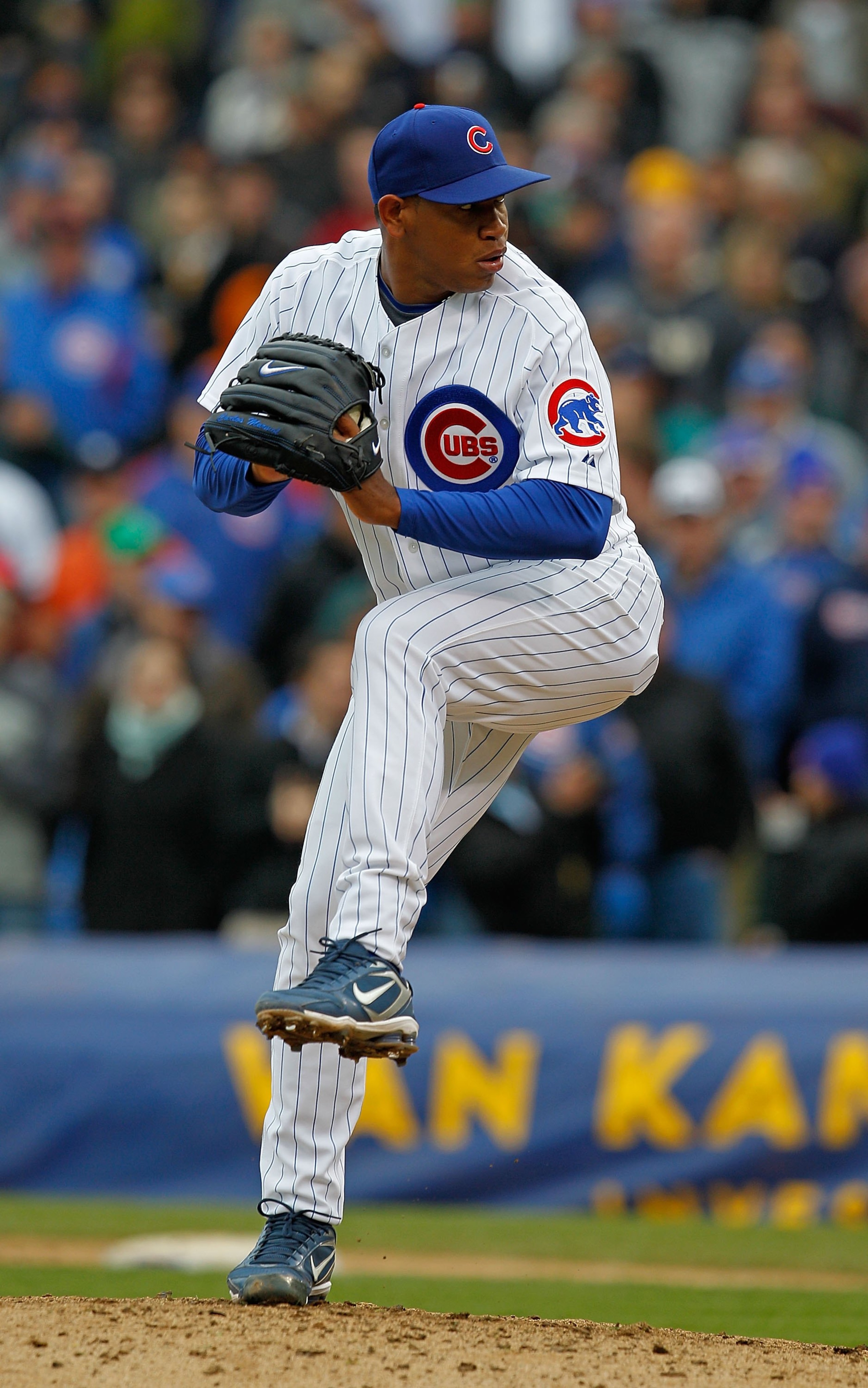 CHICAGO - MAY 12: Carlos Marmol #49 of the Chicago Cubs pitches in the 9th inning against the Florida Marlins at Wrigley Field on May 12, 2010 in Chicago, Illinois. The Cubs defeated the Marlins 4-3. (Photo by Jonathan Daniel/Getty Images)