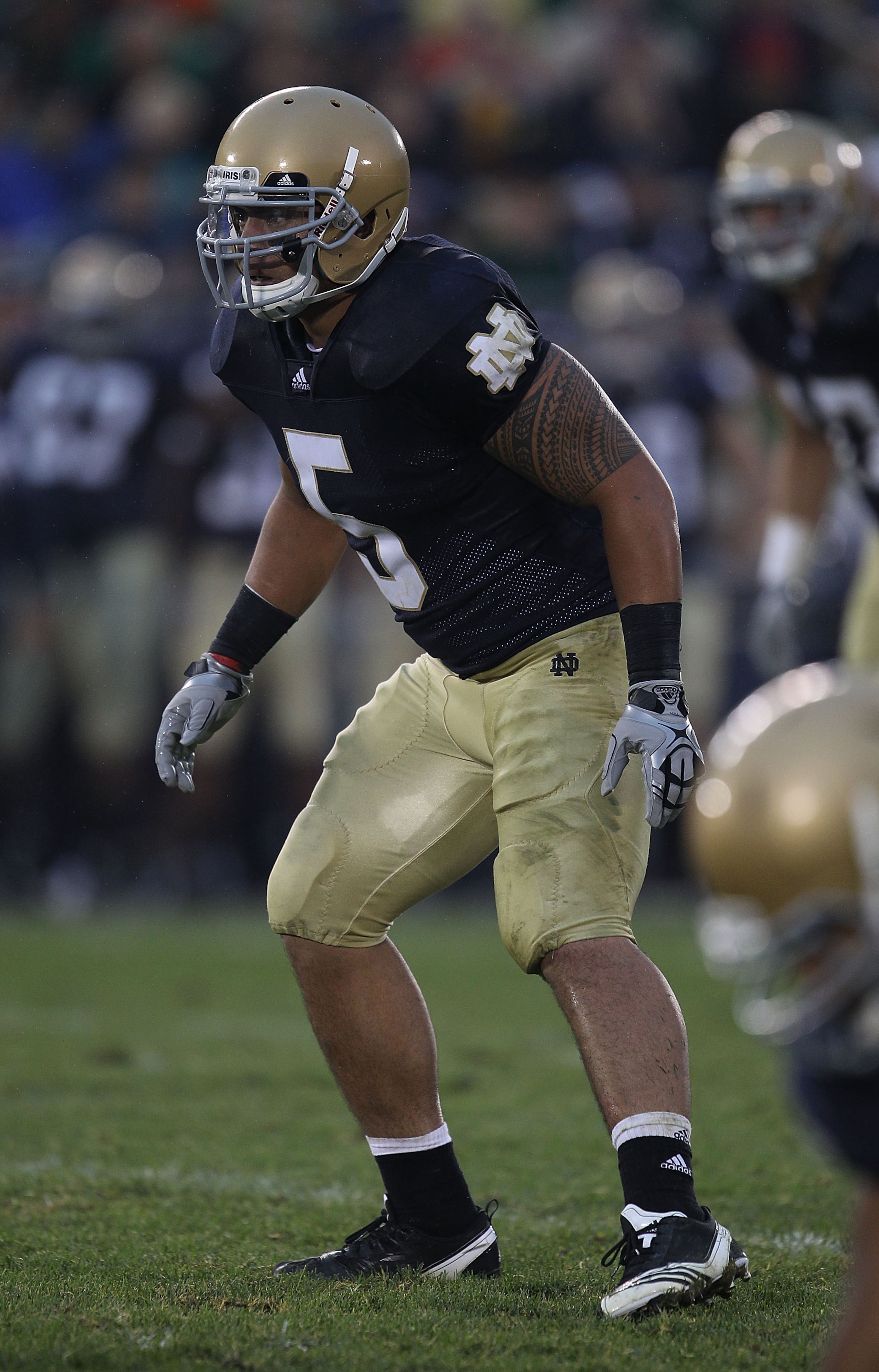 SOUTH BEND, IN - SEPTEMBER 11: Manti Te'o #5 of the Notre Dame Fighting Irish awaits the start of play against the Michigan Wolverines at Notre Dame Stadium on September 11, 2010 in South Bend, Indiana. Michigan defeated Notre Dame 28-24. (Photo by Jonath SOUTH BEND, IN - SEPTEMBER 11: Manti Te'o #5 of the Notre Dame Fighting Irish awaits the start of play against the Michigan Wolverines at Notre Dame Stadium on September 11, 2010 in South Bend, Indiana. Michigan defeated Notre Dame 28-24. (Photo by Jonath