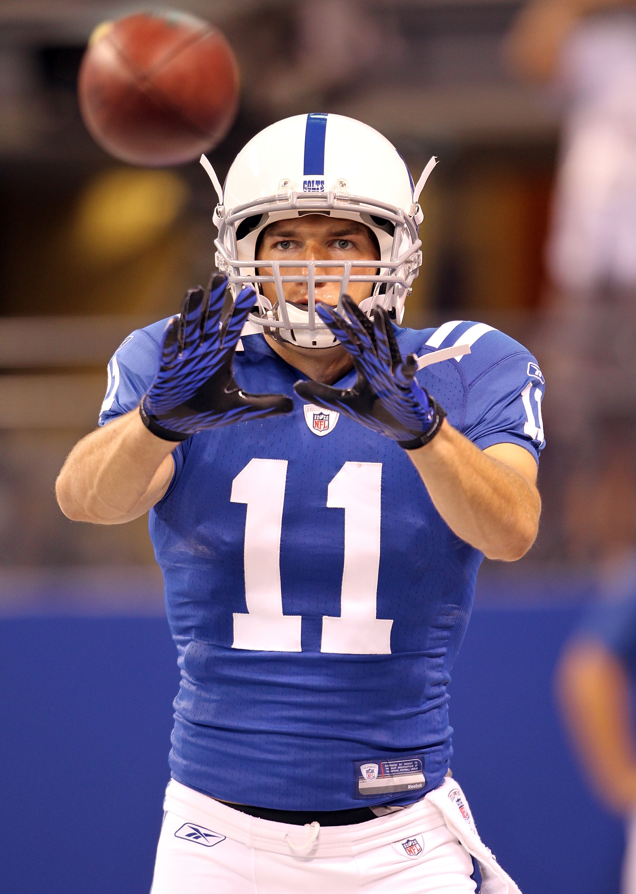 INDIANAPOLIS - SEPTEMBER 02:  Anthony Gonzalez #11 of the Indianapolis Colts catches a pass before the NFL preseason game against the Cincinnati Bengals at Lucas Oil Stadium on September 2, 2010 in Indianapolis, Indiana.  (Photo by Andy Lyons/Getty Images