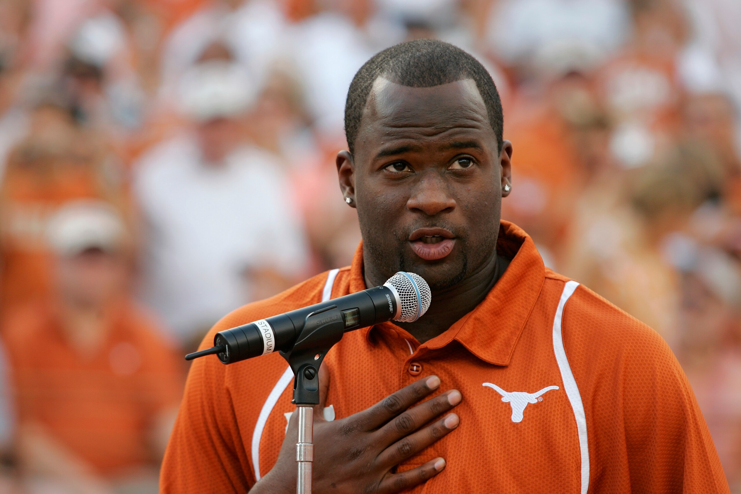 AUSTIN, TX - AUGUST 30:  Quarterback Vince Young of the Tennessee Titans speaks after his Texas Longhorns jersey number is retired before a game against the Florida Atlantic Owls at Darrell K Royal-Texas Memorial Stadium on August 30, 2007 in Austin, Texa