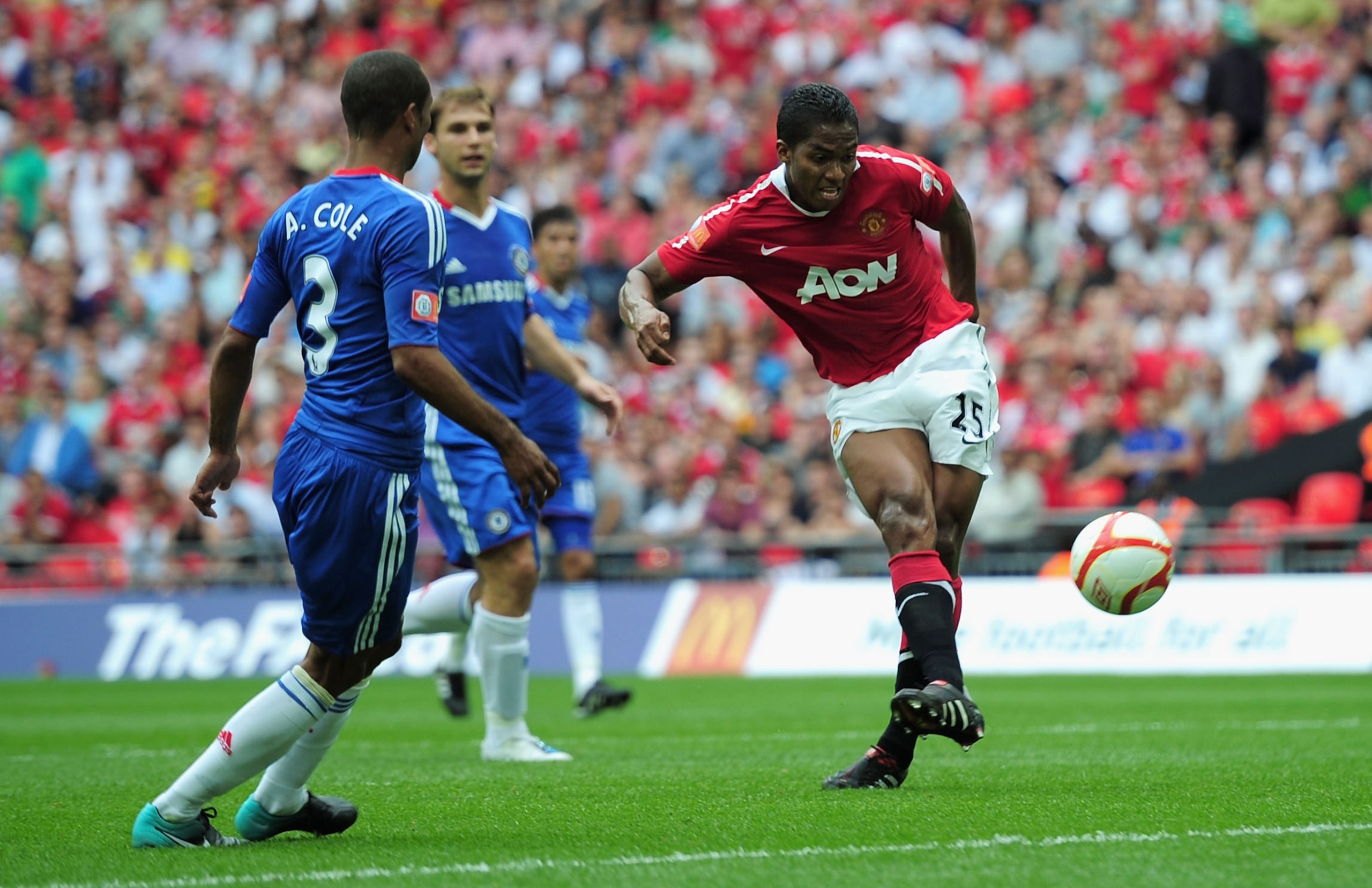 LONDON, ENGLAND - AUGUST 08:  Antonio Valencia of Manchester United (C) beats Henrique Hilario of Chelsea to score their first goal during the FA Community Shield match between Chelsea and Manchester United at Wembley Stadium on August 8, 2010 in London,