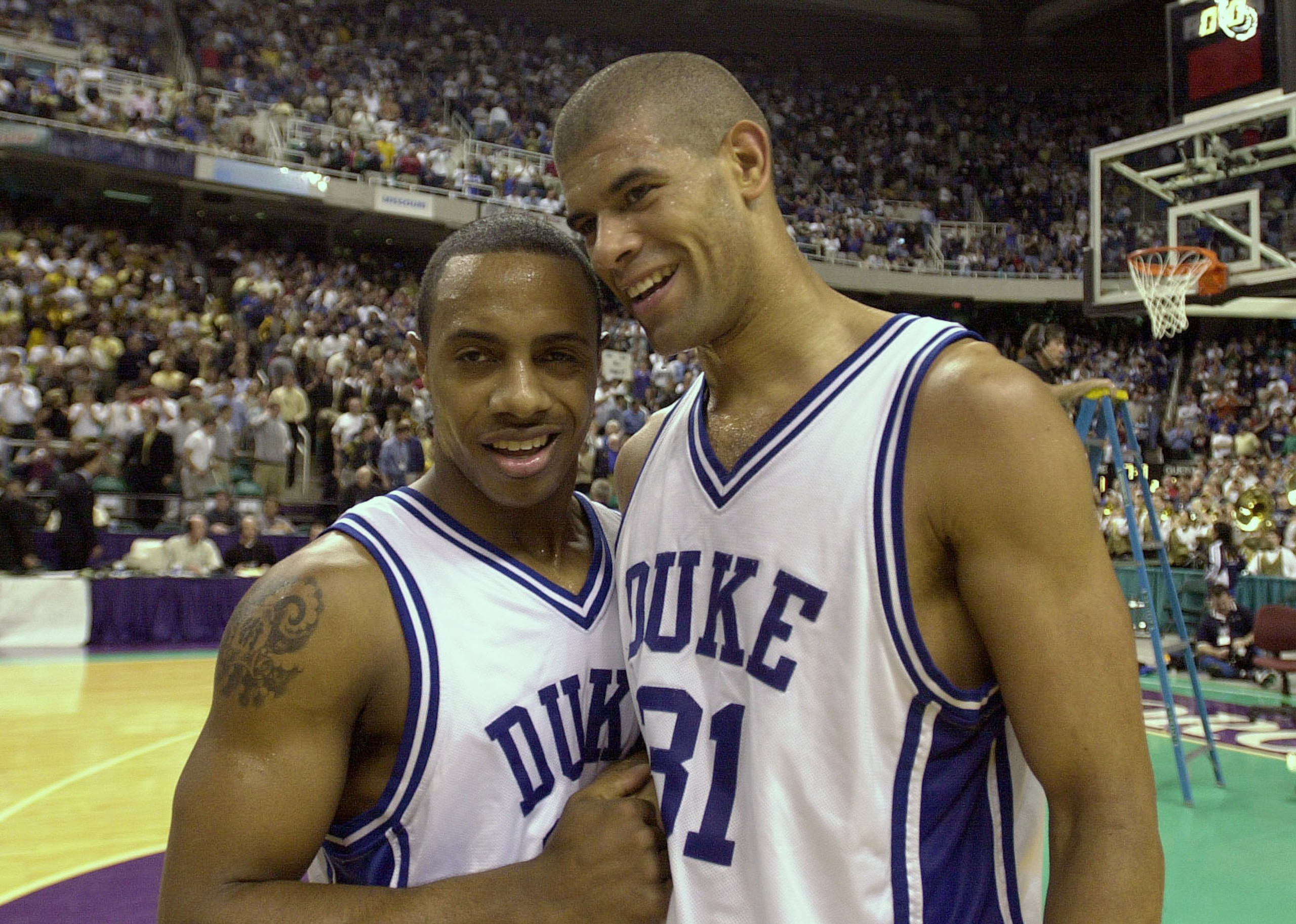 17 Mar 2001:  Jason Williams #22 and Shane Battier #31 of Duke celebrate after beating Missouri in the second round of the Men's NCAA Basketball Tournament at the Greensboro Coliseum in Greensboro, North Carolina.  Duke won 94-81. <digital image> Mandator