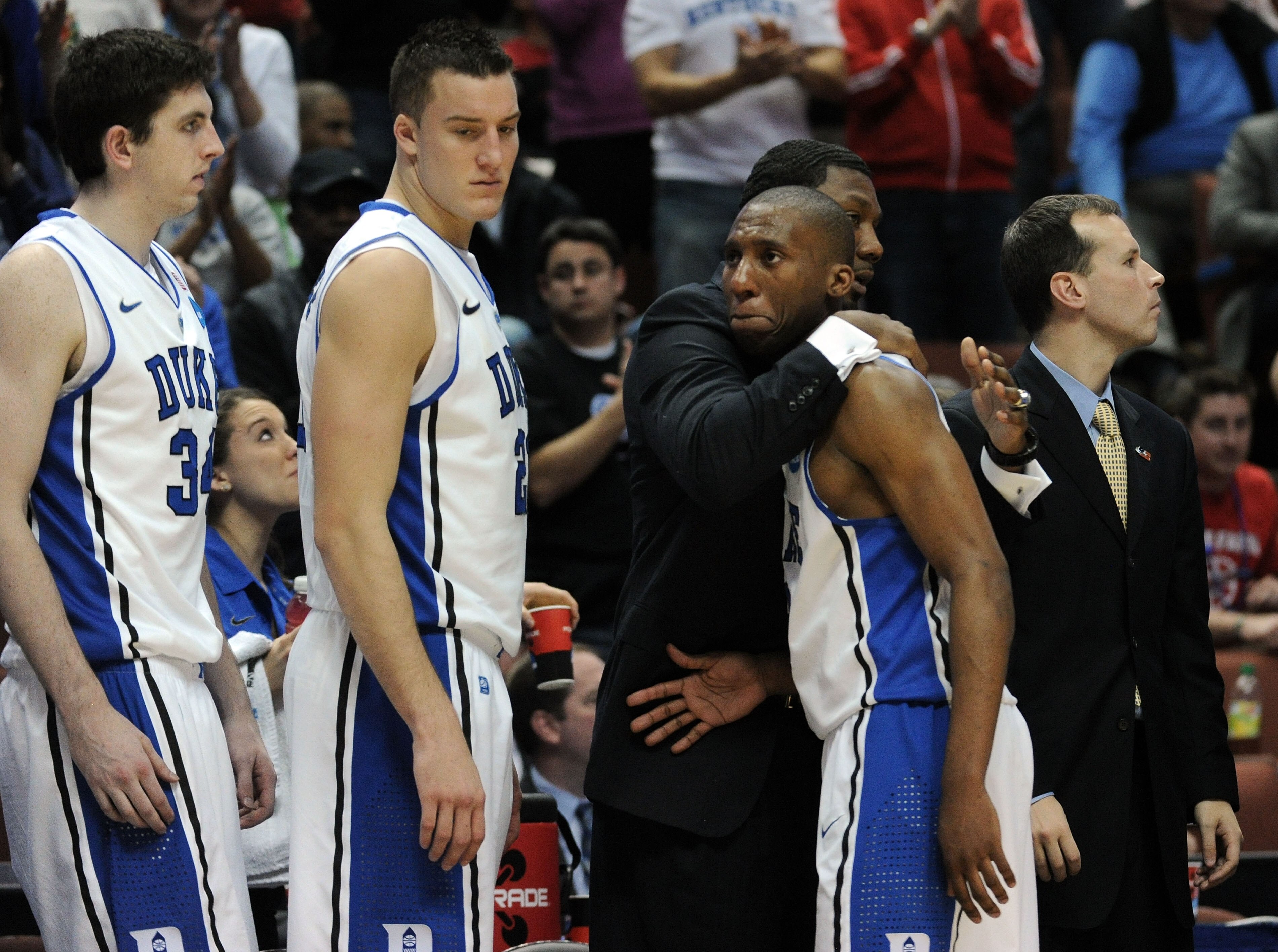 ANAHEIM, CA - MARCH 24:  Nolan Smith #2 of the Duke Blue Devils comes out of the games towards the end as teammates Ryan Kelly #34 and Miles Plumlee #21 look on against the Arizona Wildcats during the west regional semifinal of the 2011 NCAA men's basketb