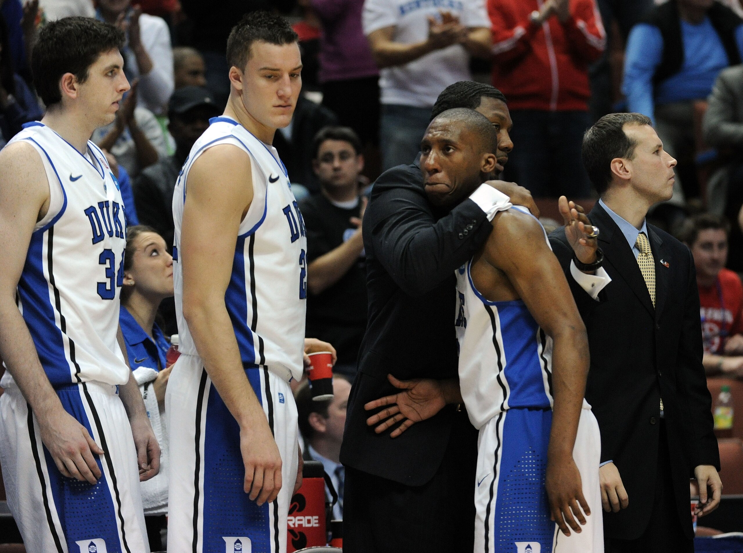 ANAHEIM, CA - MARCH 24:  Nolan Smith #2 of the Duke Blue Devils comes out of the games towards the end as teammates Ryan Kelly #34 and Miles Plumlee #21 look on against the Arizona Wildcats during the west regional semifinal of the 2011 NCAA men's basketb