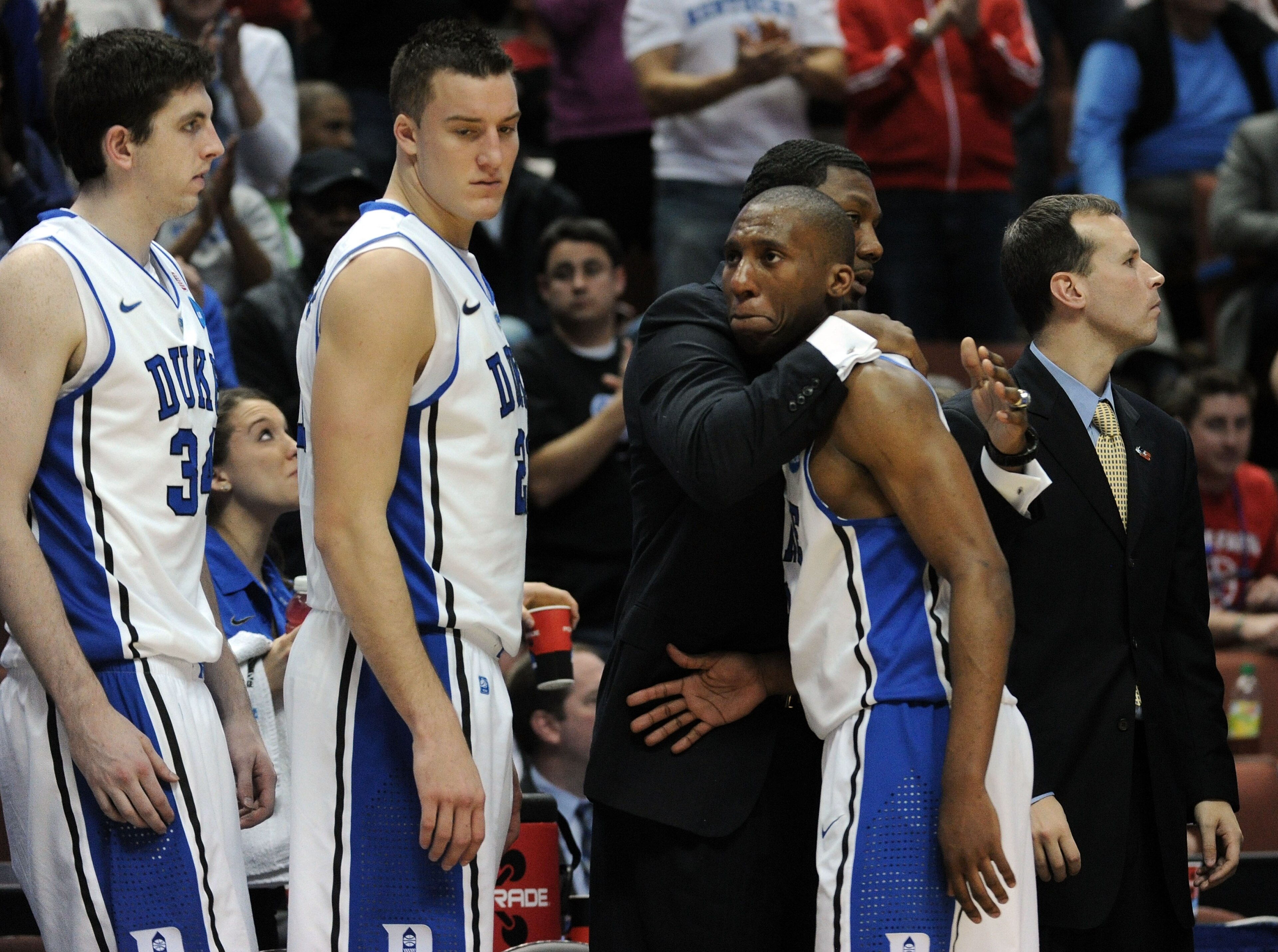 ANAHEIM, CA - MARCH 24:  Nolan Smith #2 of the Duke Blue Devils comes out of the games towards the end as teammates Ryan Kelly #34 and Miles Plumlee #21 look on against the Arizona Wildcats during the west regional semifinal of the 2011 NCAA men's basketb