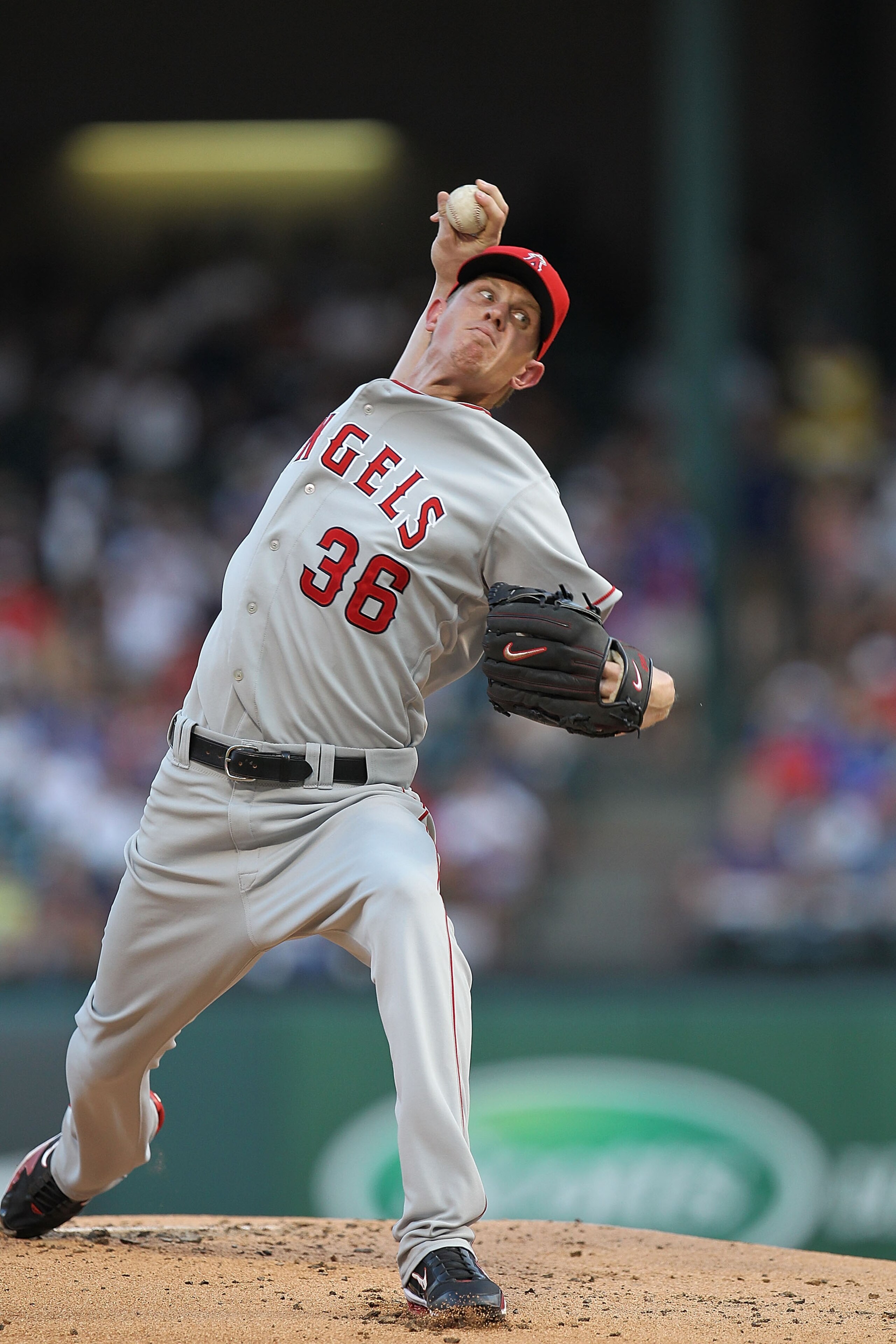 ARLINGTON, TX - JULY 22:  Pitcher Jered Weaver #36 of the Los Angeles Angels of Anaheim throws against the Texas Rangers on July 22, 2010 at Rangers Ballpark in Arlington, Texas.  (Photo by Ronald Martinez/Getty Images)