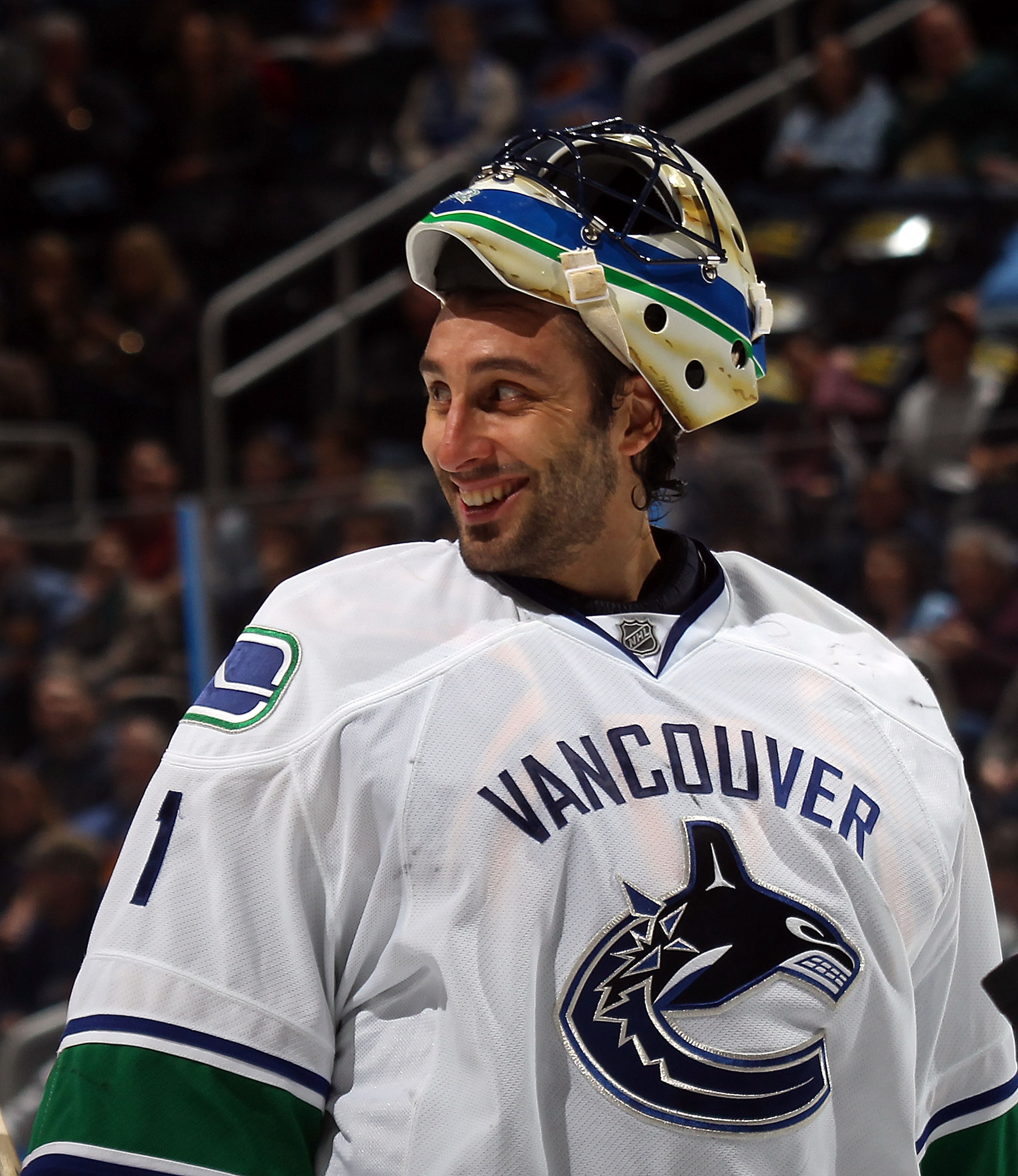 ATLANTA, GA - MARCH 25: Roberto Luongo #1 of the Vancouver Canucks responds to a comment by Dustin Byfuglien #33 of the Atlanta Thrashers during a timeout at the Philips Arena on March 25, 2011 in Atlanta, Georgia. (Photo by Bruce Bennett/Getty Images) ATLANTA, GA - MARCH 25: Roberto Luongo #1 of the Vancouver Canucks responds to a comment by Dustin Byfuglien #33 of the Atlanta Thrashers during a timeout at the Philips Arena on March 25, 2011 in Atlanta, Georgia. (Photo by Bruce Bennett/Getty Images)
