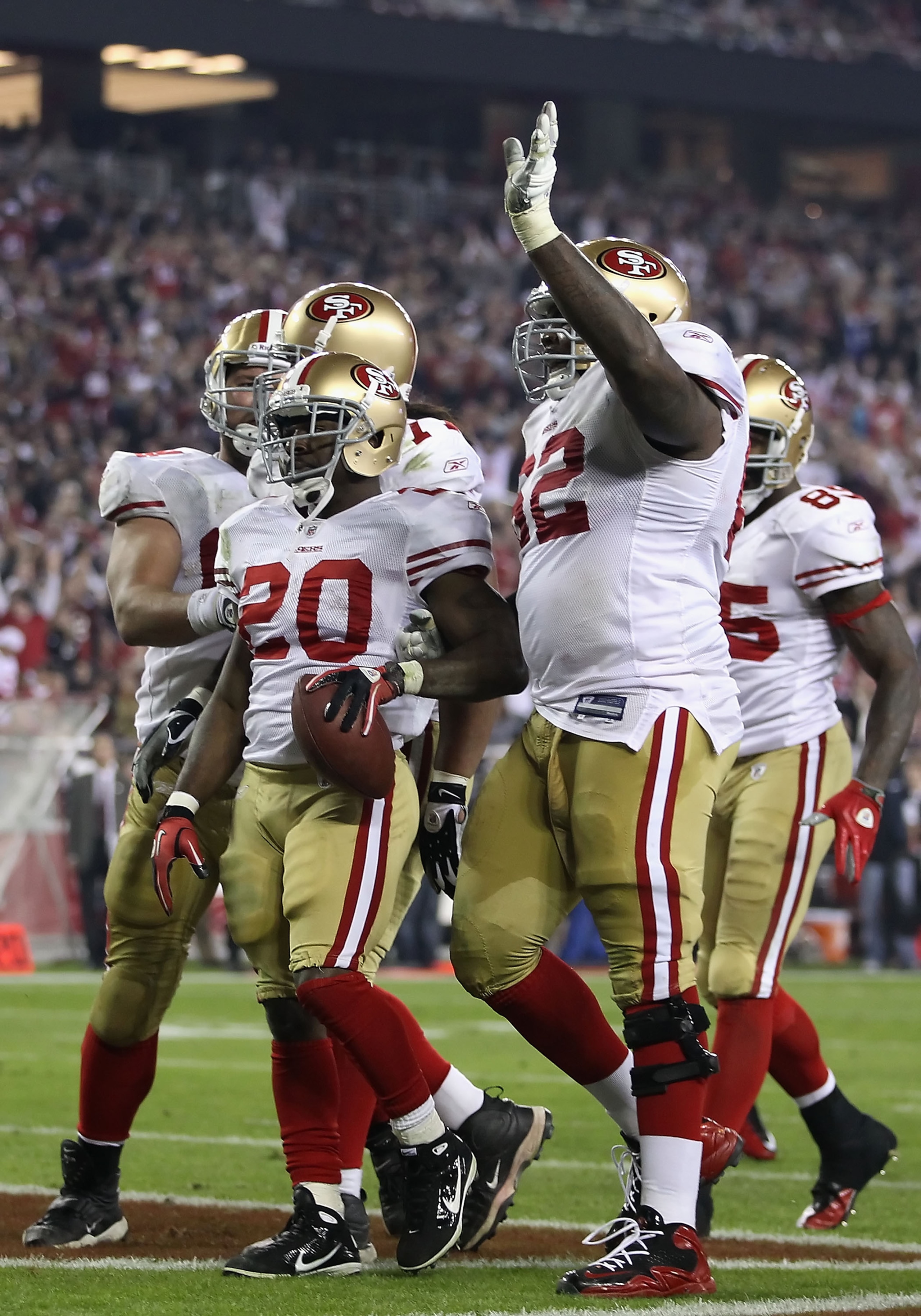 GLENDALE, AZ - NOVEMBER 29:  Runningback Brian Westbrook #20 of the San Francisco 49ers celebrates with teammates after scoring on a 8 yard rushing touchdown against the Arizona Cardinals during the second quarter of the NFL game at the University of Phoe