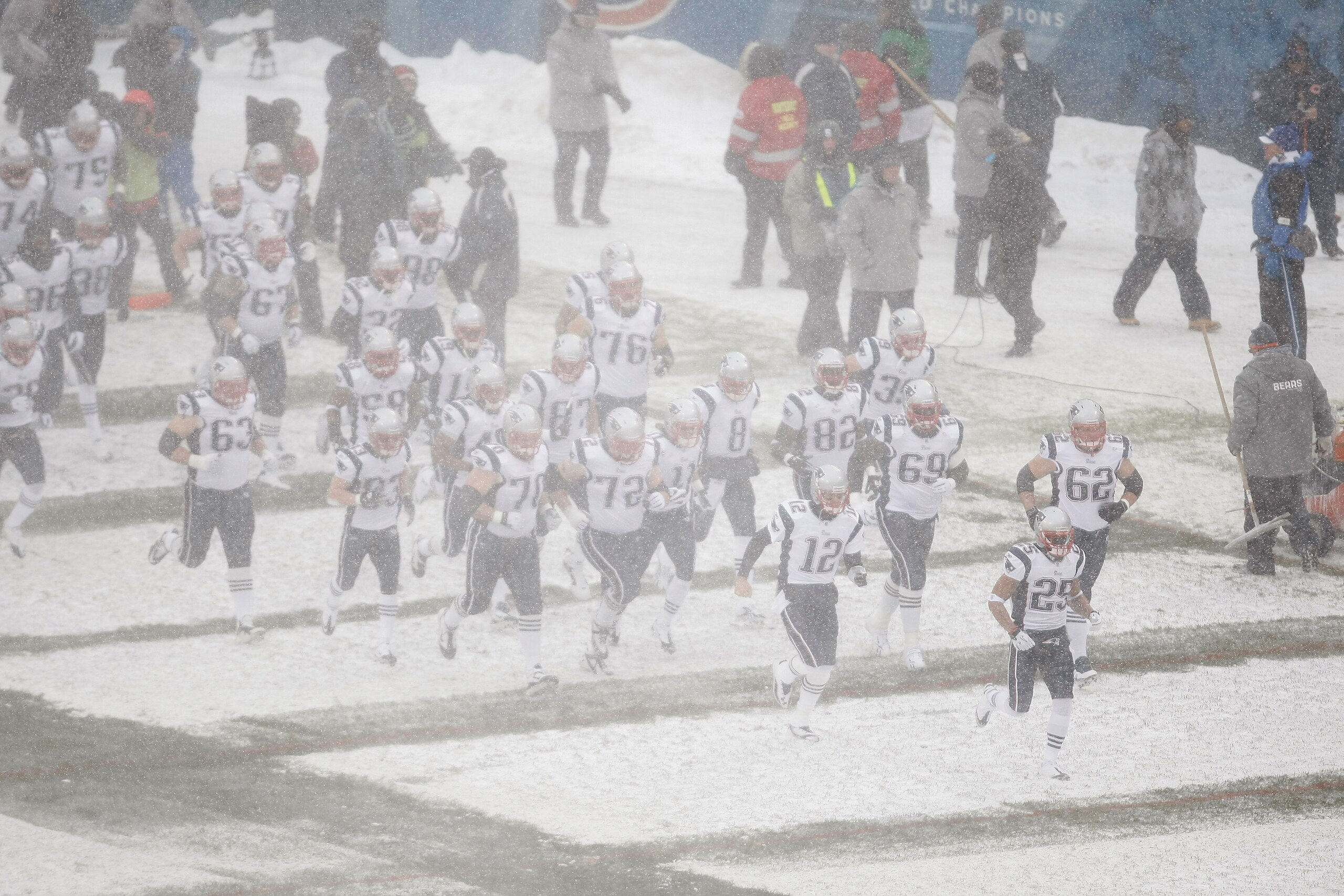 CHICAGO, IL - DECEMBER 12: New England Patriots run on the field during the game between the New England Patriots against the Chicago Bears at Soldier Field on December 12, 2010 in Chicago, Illinois. (Photo by Scott Boehm/Getty Images)