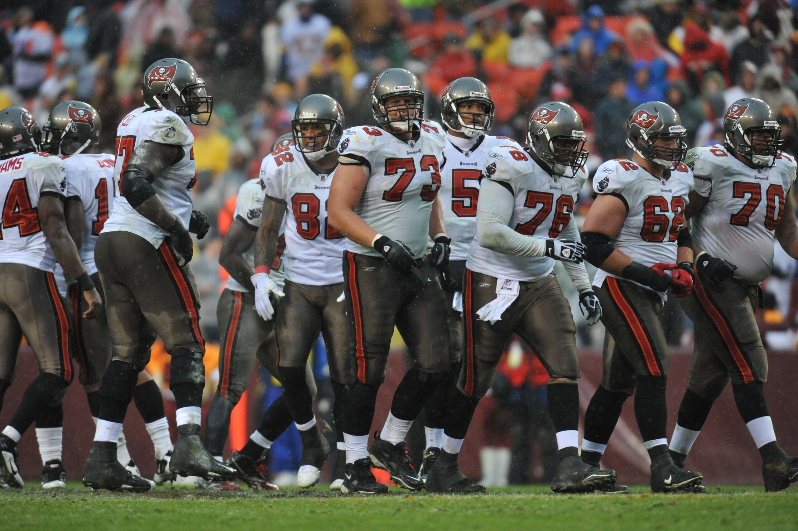 LANDOVER, MD - DECEMBER 12:  Derek Hardman #73 of the Tampa Bay Buccaneers walks up to the line of scrimmage with the defensive line during the game against the Washington Redskins  at FedExField on December 12, 2010 in Landover, Maryland. The Buccaneers