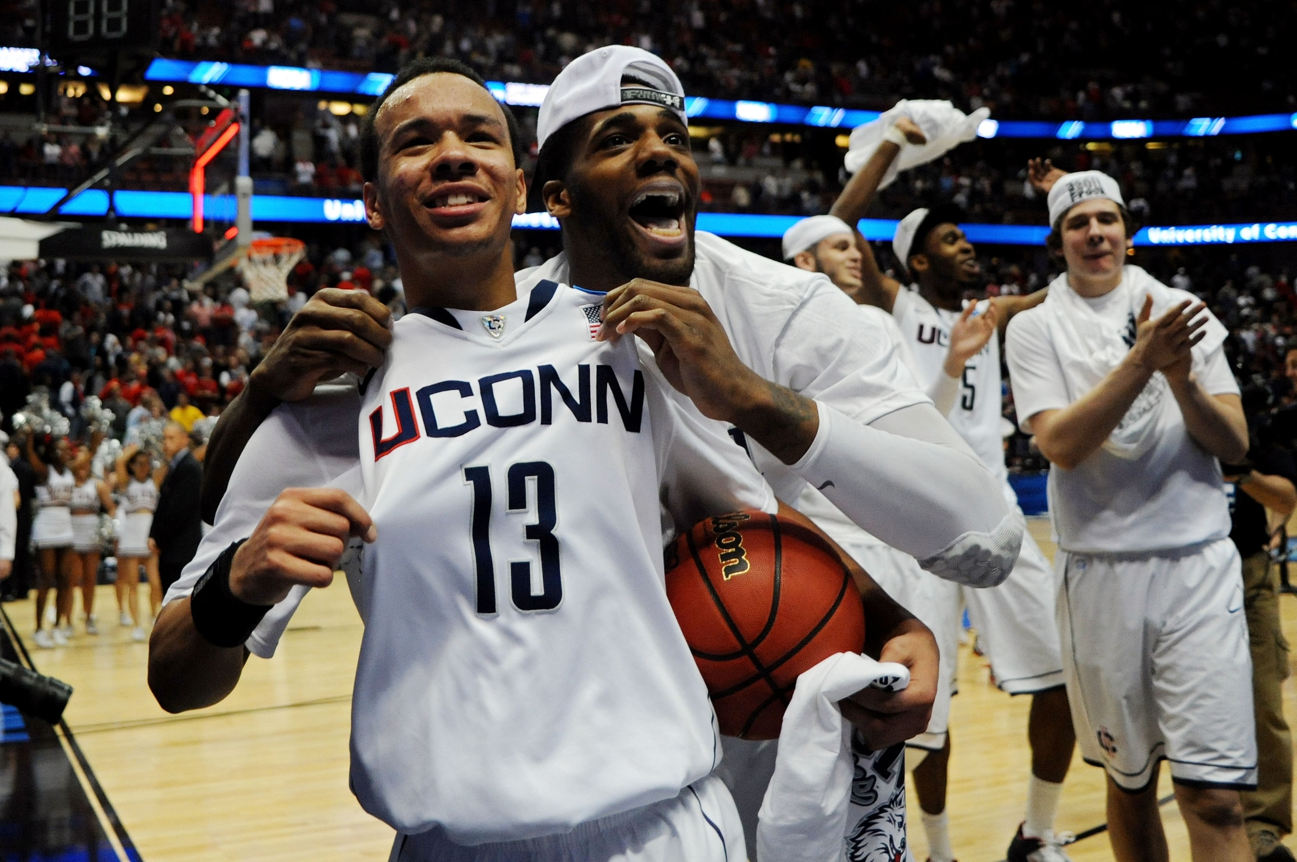 ANAHEIM, CA - MARCH 26:  Shabazz Napier #13 and Alex Oriakhi #34 of the Connecticut Huskies celebrate after defeating the Arizona Wildcats during the west regional final of the 2011 NCAA men's basketball tournament at the Honda Center on March 26, 2011 in