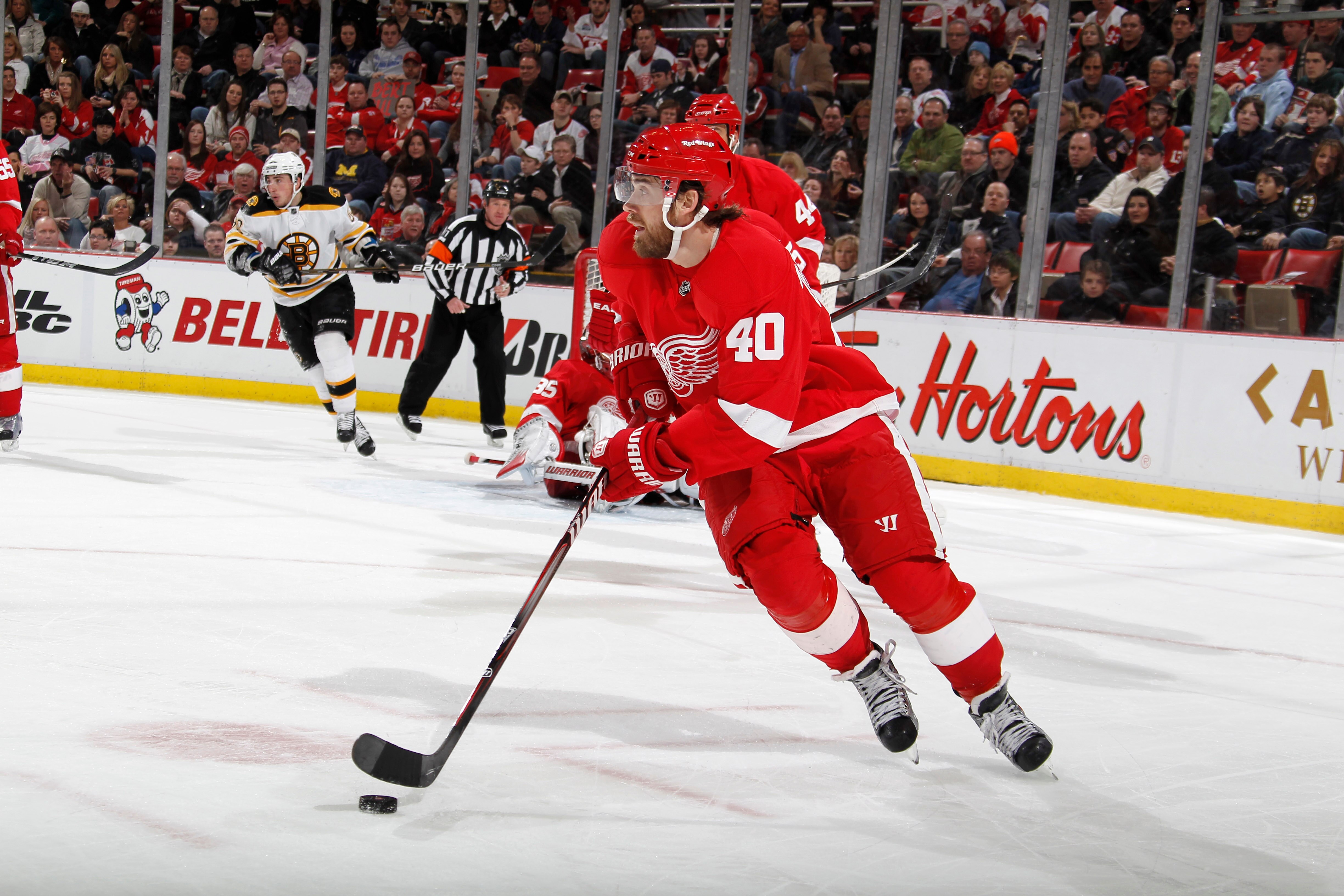 DETROIT, MI - FEBRUARY 13:  Henrik Zeterberg #40 of the Detroit Red Wings skates with the puck against the Boston Bruins on February 13, 2011 in Detroit, Michigan.  (Photo by Gregory Shamus/Getty Images)