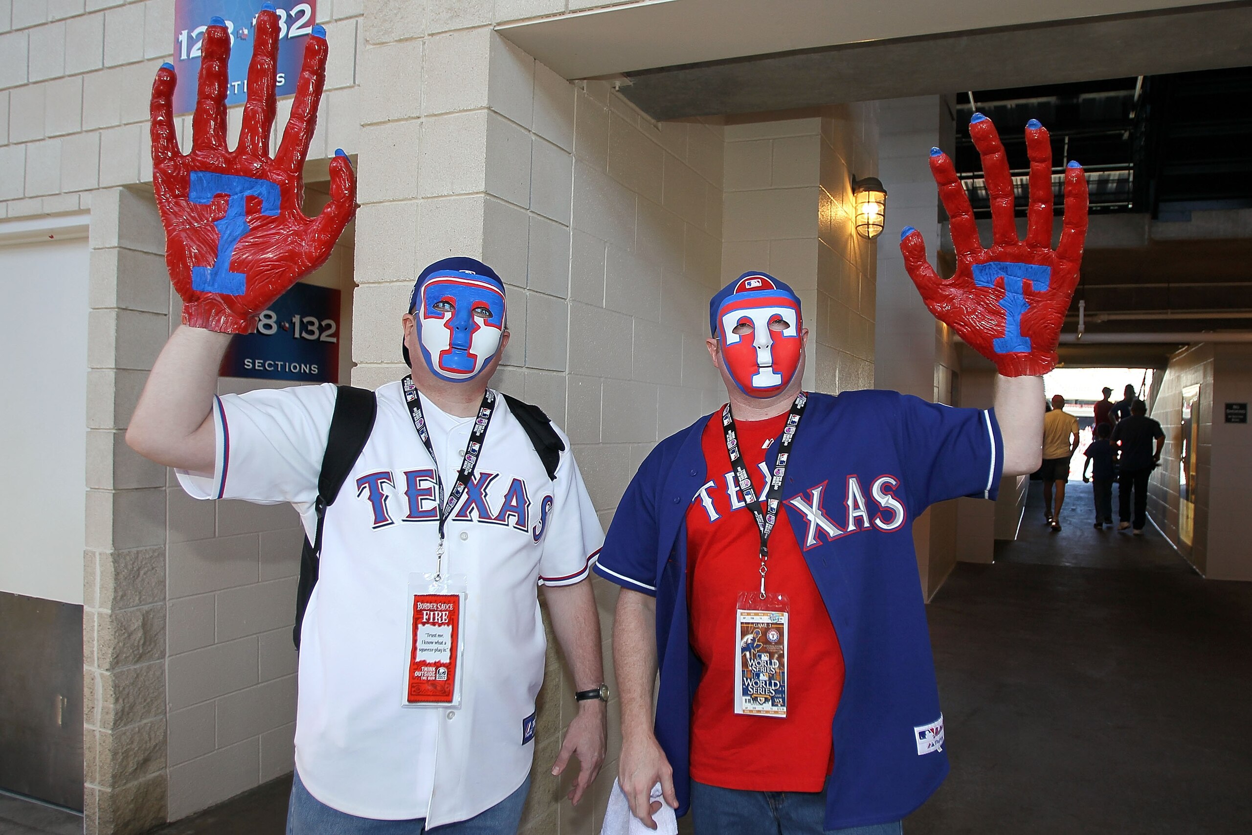 ARLINGTON, TX - OCTOBER 30:  Fans of the Texas Rangers support their team against the San Francisco Giants in Game Three of the 2010 MLB World Series at Rangers Ballpark in Arlington on October 30, 2010 in Arlington, Texas.  (Photo by Stephen Dunn/Getty I