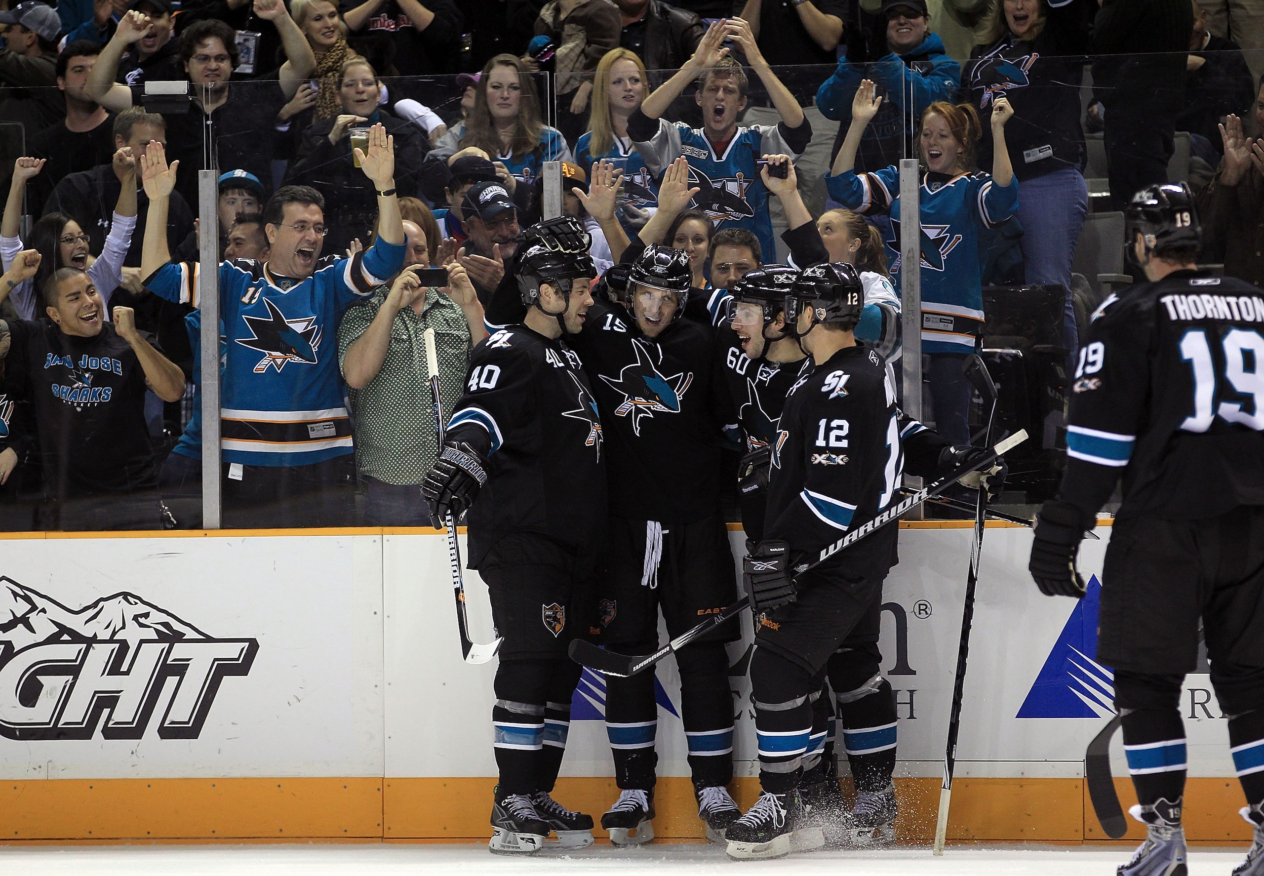 SAN JOSE, CA - NOVEMBER 15:  Dany Heatley #15 of the San Jose Sharks is congratulated by teammates Kent Huskins #40, Jason Demers #60, Patrick Marleau #12 and Joe Thornton #19 after he scored a goal during their game against the Los Angeles Kings at HP Pa