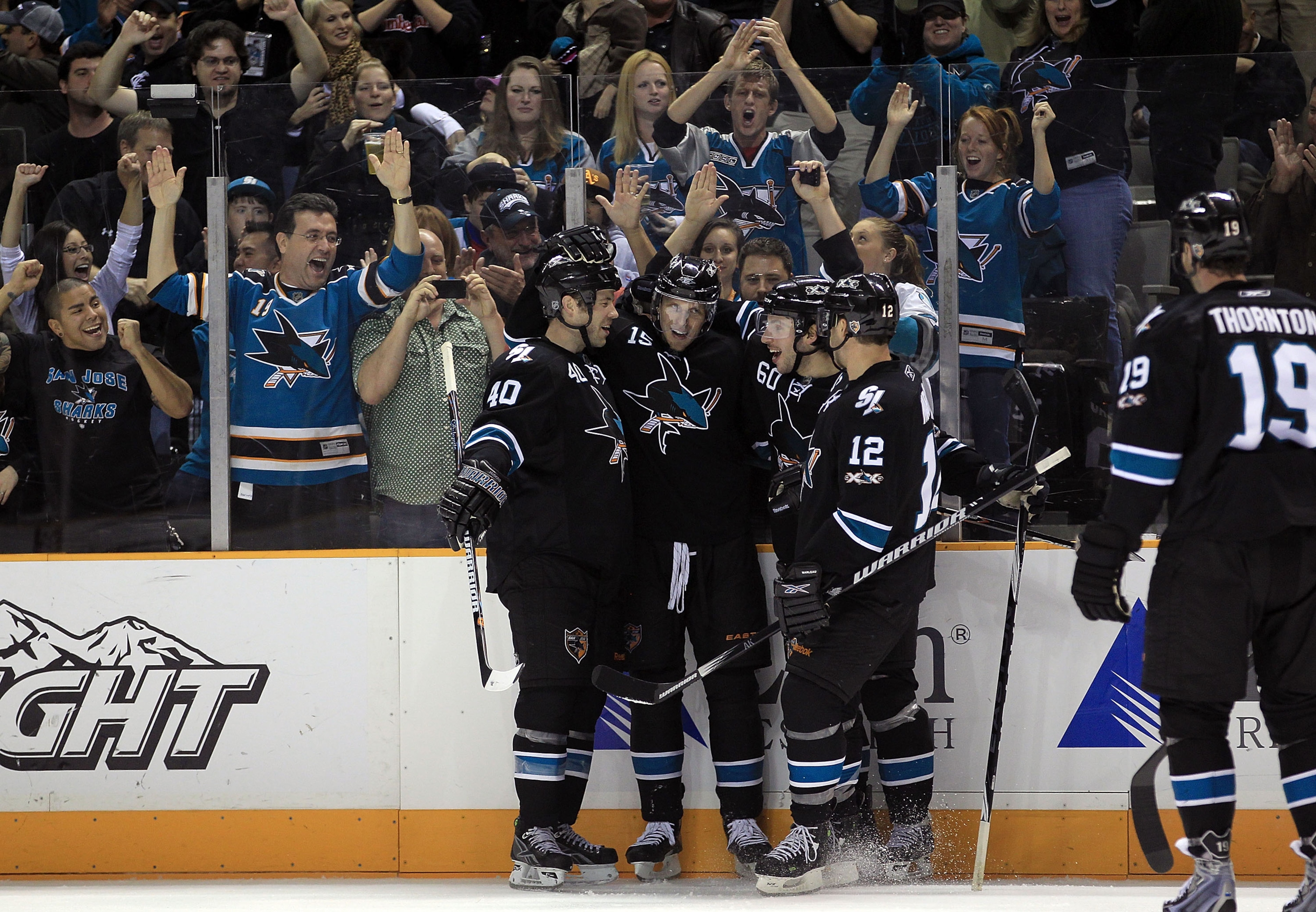 SAN JOSE, CA - NOVEMBER 15:  Dany Heatley #15 of the San Jose Sharks is congratulated by teammates Kent Huskins #40, Jason Demers #60, Patrick Marleau #12 and Joe Thornton #19 after he scored a goal during their game against the Los Angeles Kings at HP Pa