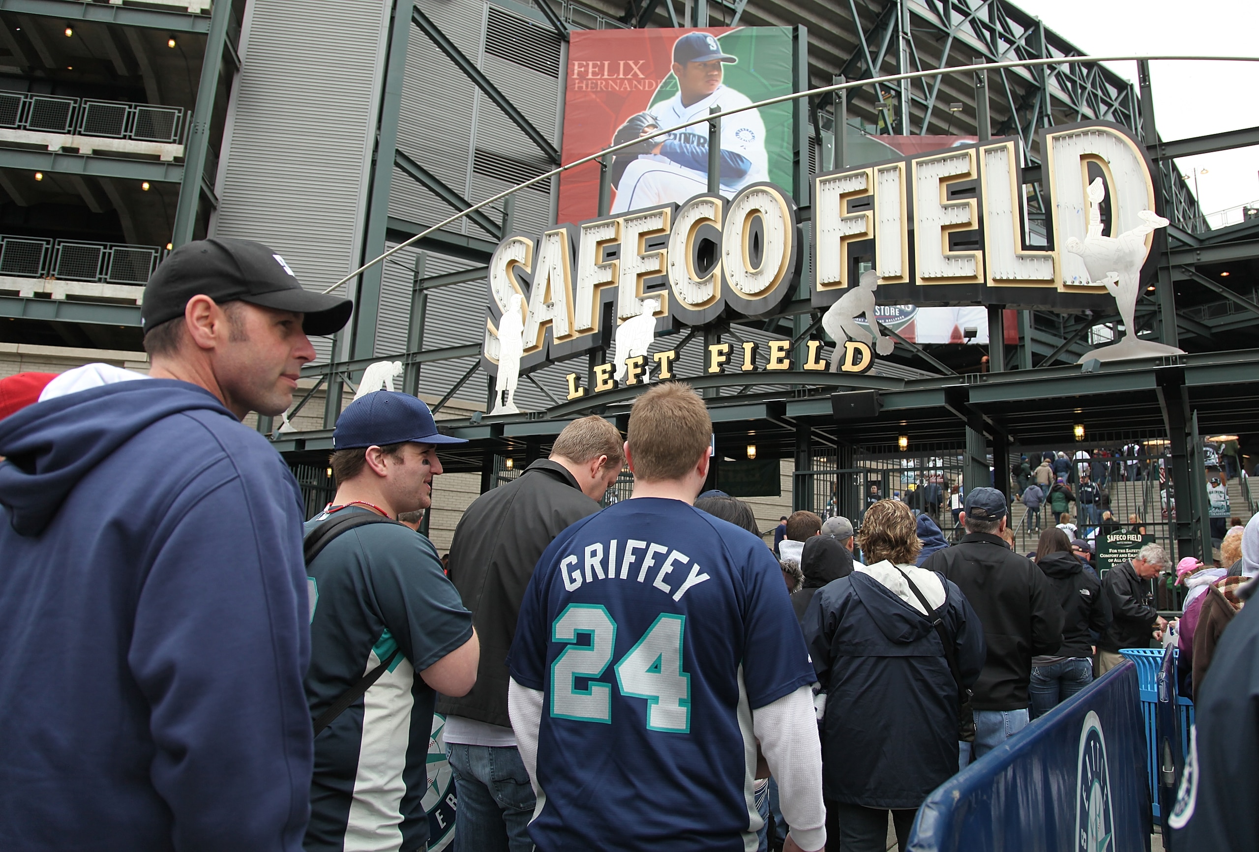 SEATTLE - APRIL 14:   Fans enter the stadium before the Seattle Mariners and the Los Angeles Angels of Anaheim play on Opening Day on April 14, 2009 at Safeco Field in Seattle, Washington. (Photo by Otto Greule Jr/Getty Images)
