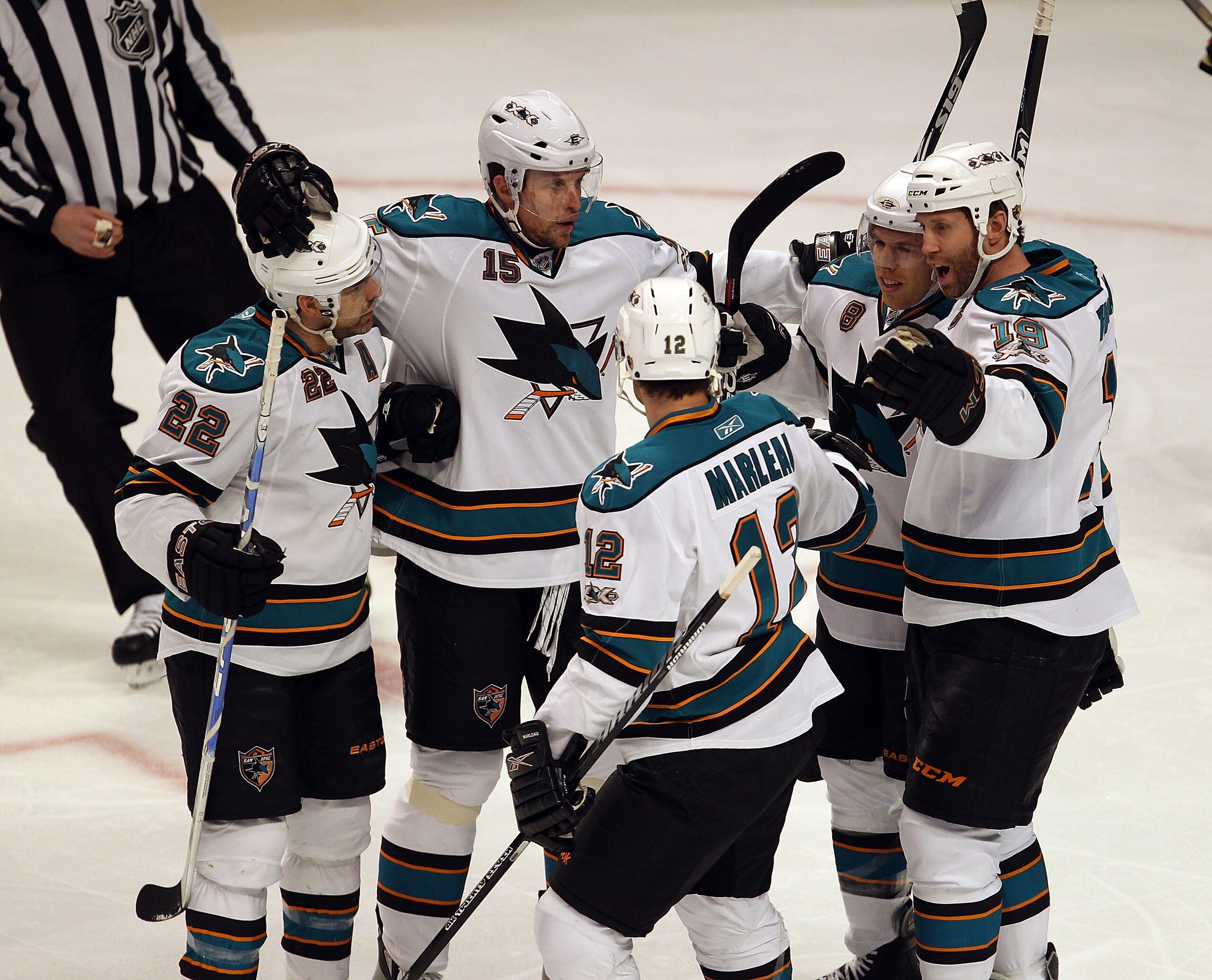 CHICAGO, IL - MARCH 14: (L-R) Dan Boyle #22, Dany Heatley #15, Patrick Marleau #12, Ian White #9 and Joe Thornton #19 of the San Jose Sharks celebrate a goal against the Chicago Blackhawks at the United Center on March 14, 2011 in Chicago, Illinois. The B