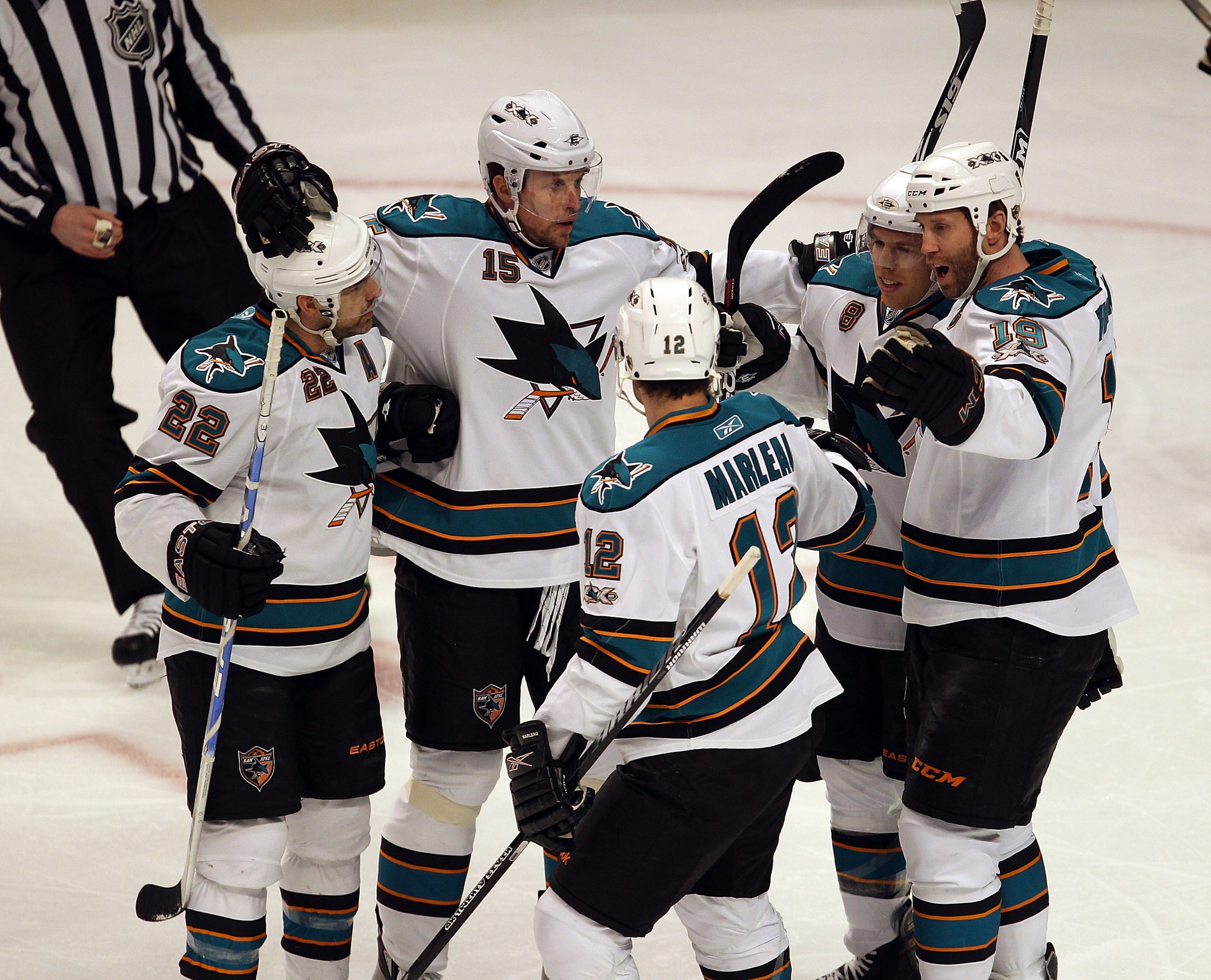 CHICAGO, IL - MARCH 14: (L-R) Dan Boyle #22, Dany Heatley #15, Patrick Marleau #12, Ian White #9 and Joe Thornton #19 of the San Jose Sharks celebrate a goal against the Chicago Blackhawks at the United Center on March 14, 2011 in Chicago, Illinois. The B