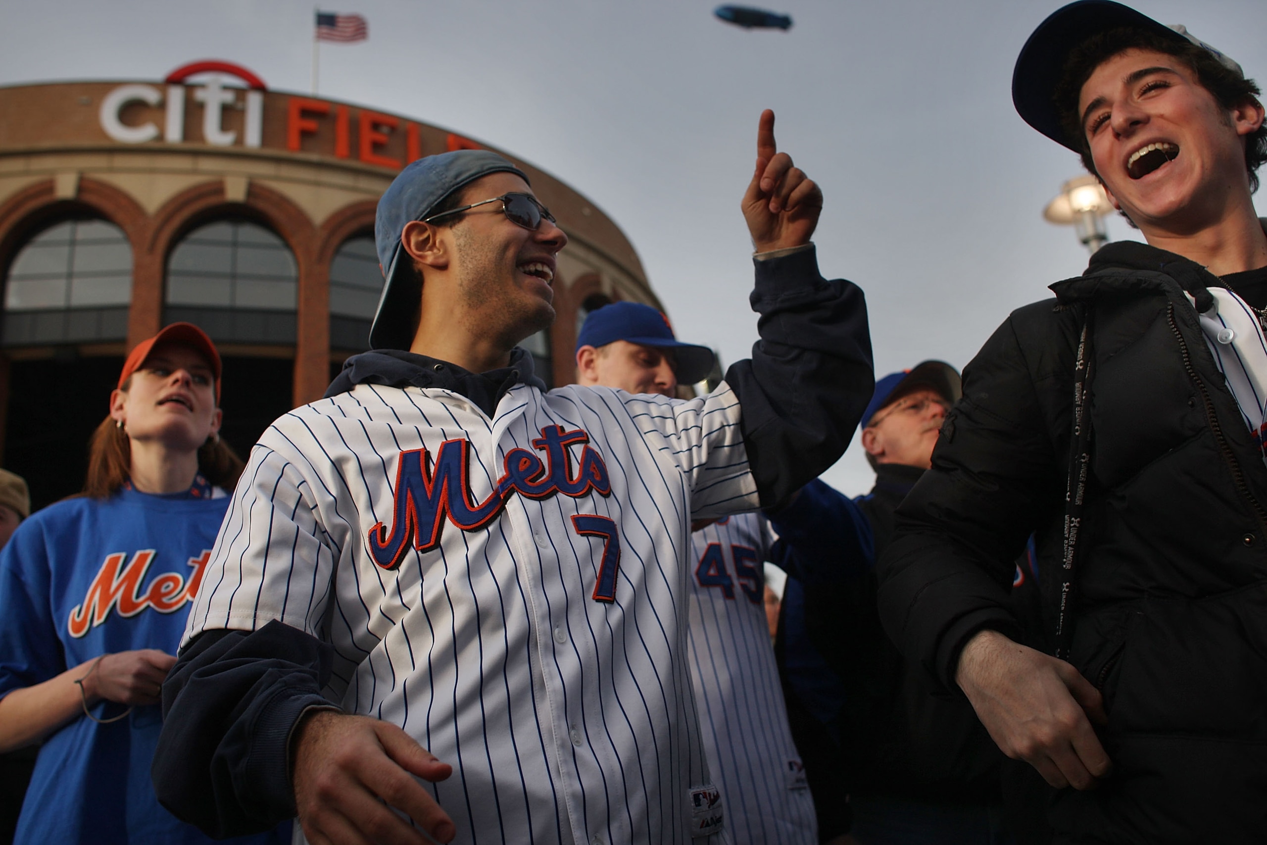 NEW YORK - APRIL 13:  Fans stand outside before the start of the Opening Day game between the San Diego Padres and the New York Mets at Citi Field on April 13, 2009 in the Flushing neighborhood of the Queens borough of New York City. This is the first reg