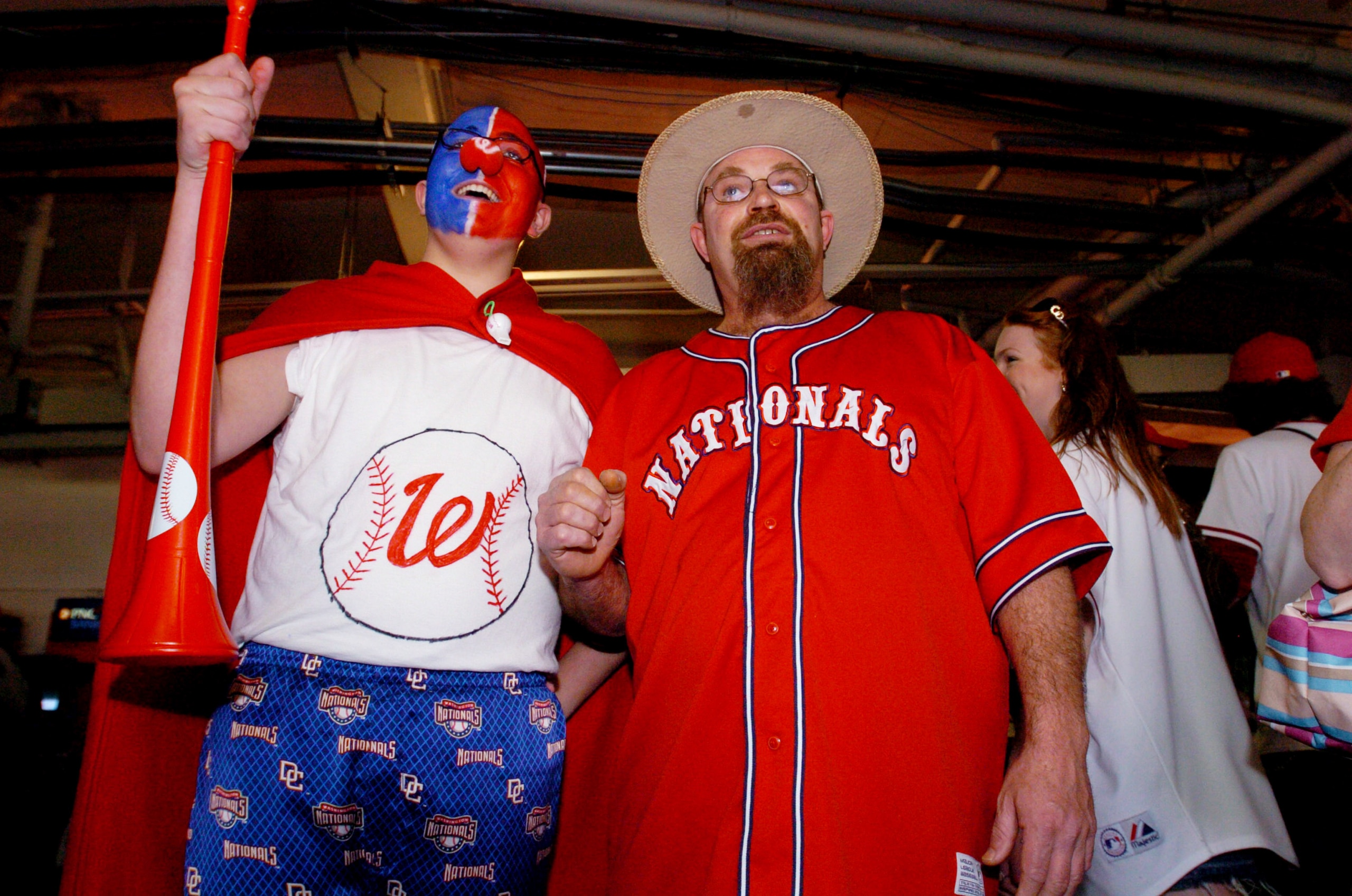 WASHINGTON - APRIL 2:  Fans of the Washington Nationals cheer against the Florida Marlins on Opening Day April 2, 2007 at RFK Stadium in Washington, D.C.  (Photo by Larry French/Getty Images)