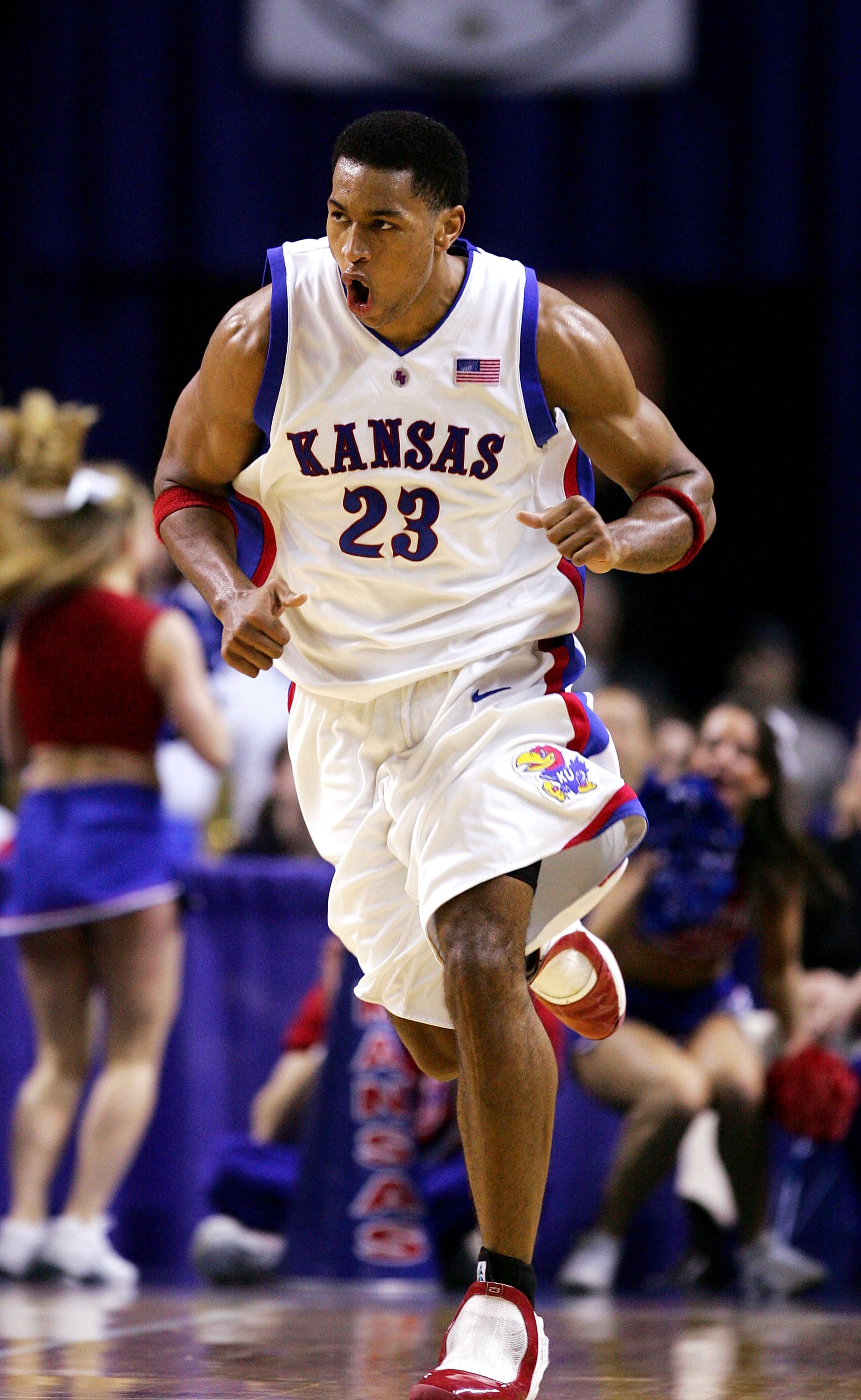 KANSAS CITY, MO - MARCH 11:  Wayne Simien #23 of the Kansas Jayhawks is excited as he runs back on defense in the second half against the Kansas State Wildcats in Day 2 of the Phillips 66 Big 12 Men's Basketball Tournament at Kemper Arena on March 11, 200