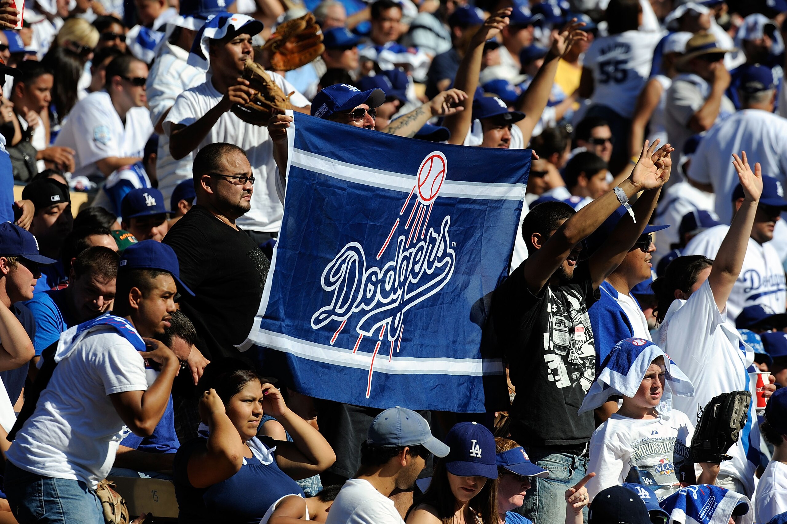LOS ANGELES, CA - OCTOBER 16:  Dodger fans cheer on during Game Two of the NLCS during the 2009 MLB Playoffs between the Philadelphia Phillies and the Los Angeles Dodgers at Dodger Stadium on October 16, 2009 in Los Angeles, California.  (Photo by Kevork