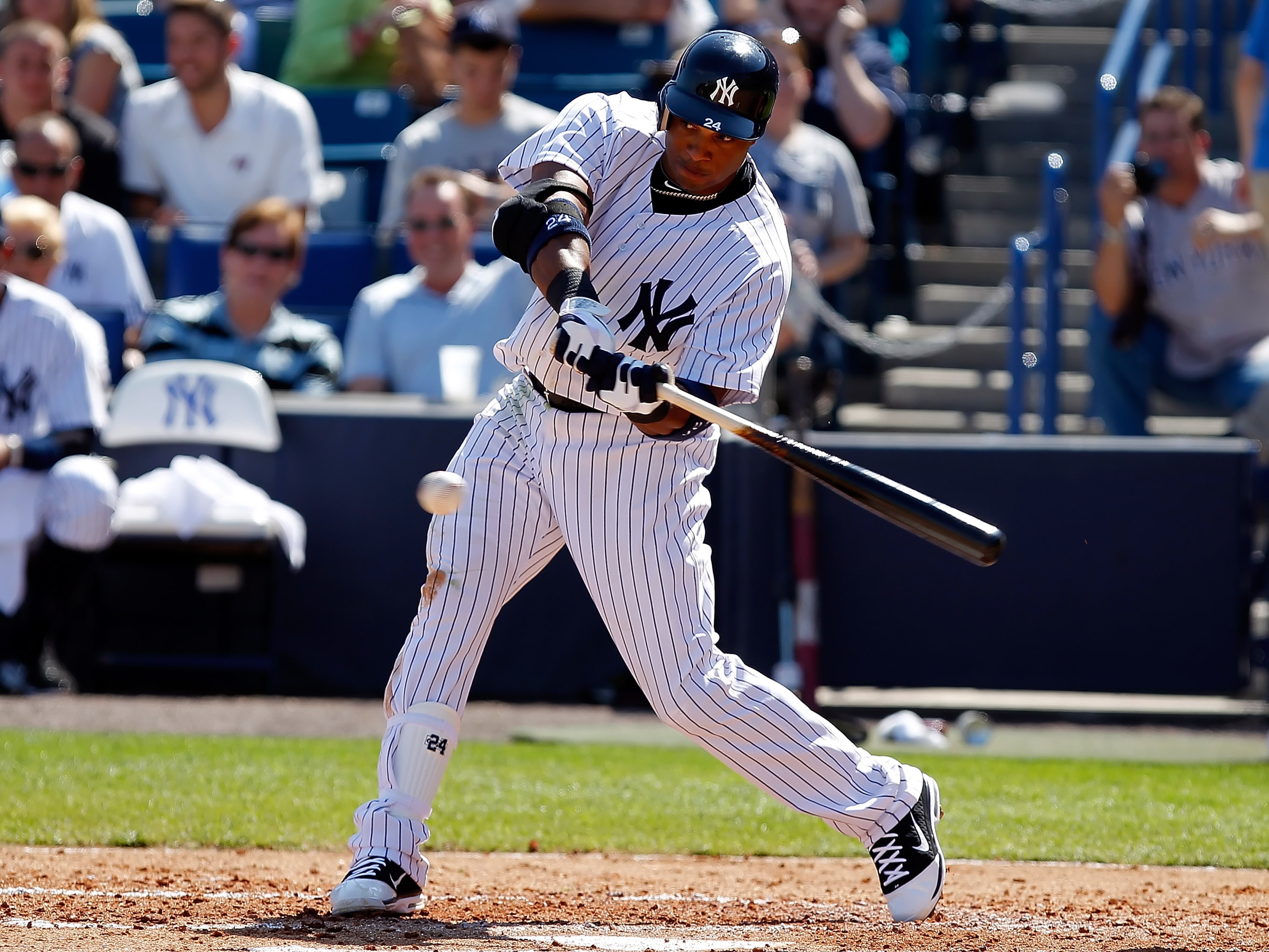TAMPA, FL - FEBRUARY 26: Infielder Robinson Cano #24 of the New York Yankees fouls off a pitch against the Philadelphia Phillies during a Grapefruit League Spring Training Game at George M. Steinbrenner Field on February 26, 2011 in Tampa, Florida. (Pho TAMPA, FL - FEBRUARY 26: Infielder Robinson Cano #24 of the New York Yankees fouls off a pitch against the Philadelphia Phillies during a Grapefruit League Spring Training Game at George M. Steinbrenner Field on February 26, 2011 in Tampa, Florida. (Pho