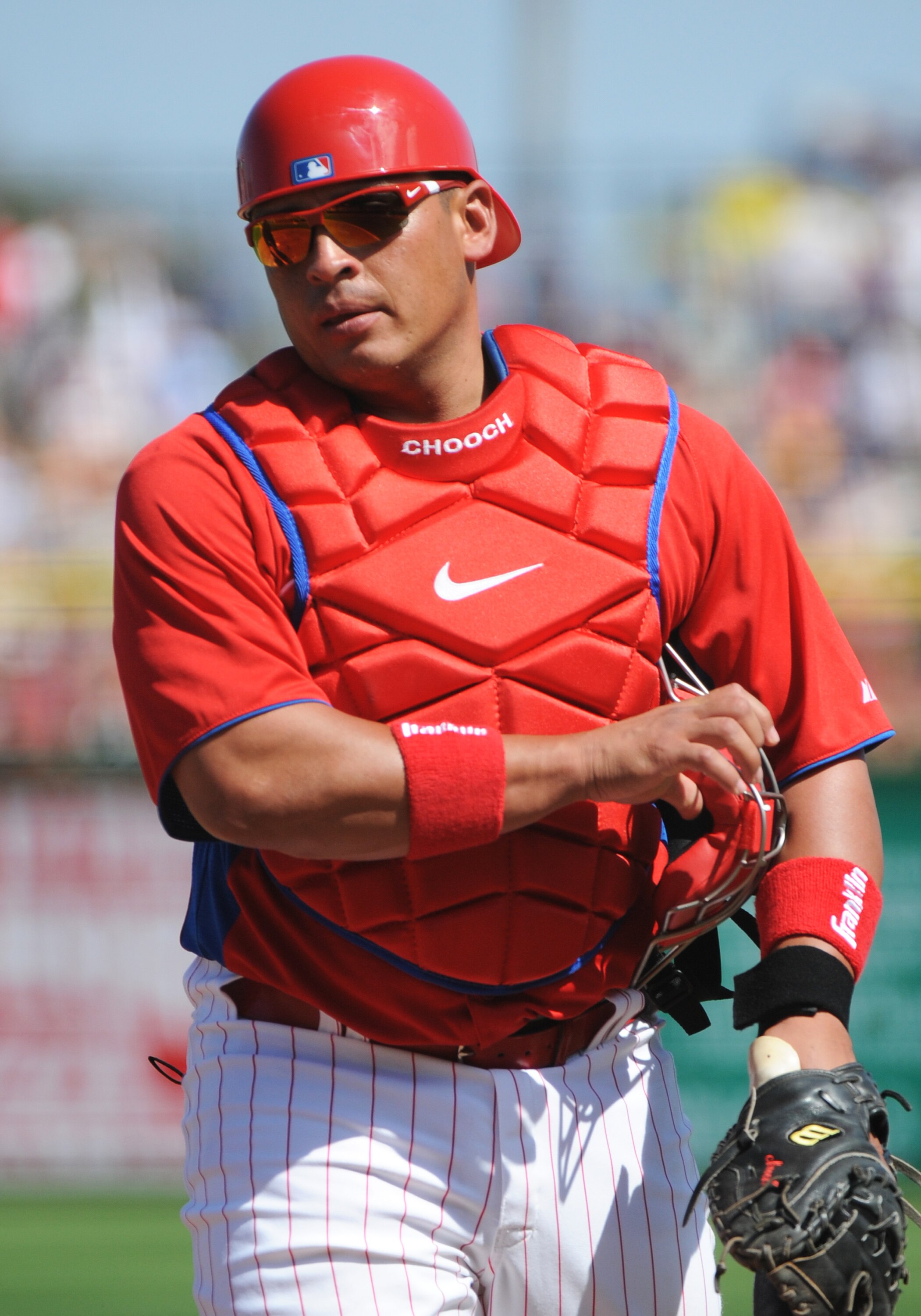 CLEARWATER, FL - FEBRUARY 27:  Catcher Carlos Ruiz #51 of the Philadelphia Phillies sets for play against the New York Yankees February 27, 2011 at Bright House Field in Clearwater, Florida.  (Photo by Al Messerschmidt/Getty Images)